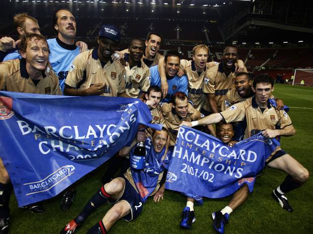 Arsenal celebrate their title triumph at Old Trafford in May 2002 - but can you spot the goalscorer Sylvain Wiltord?