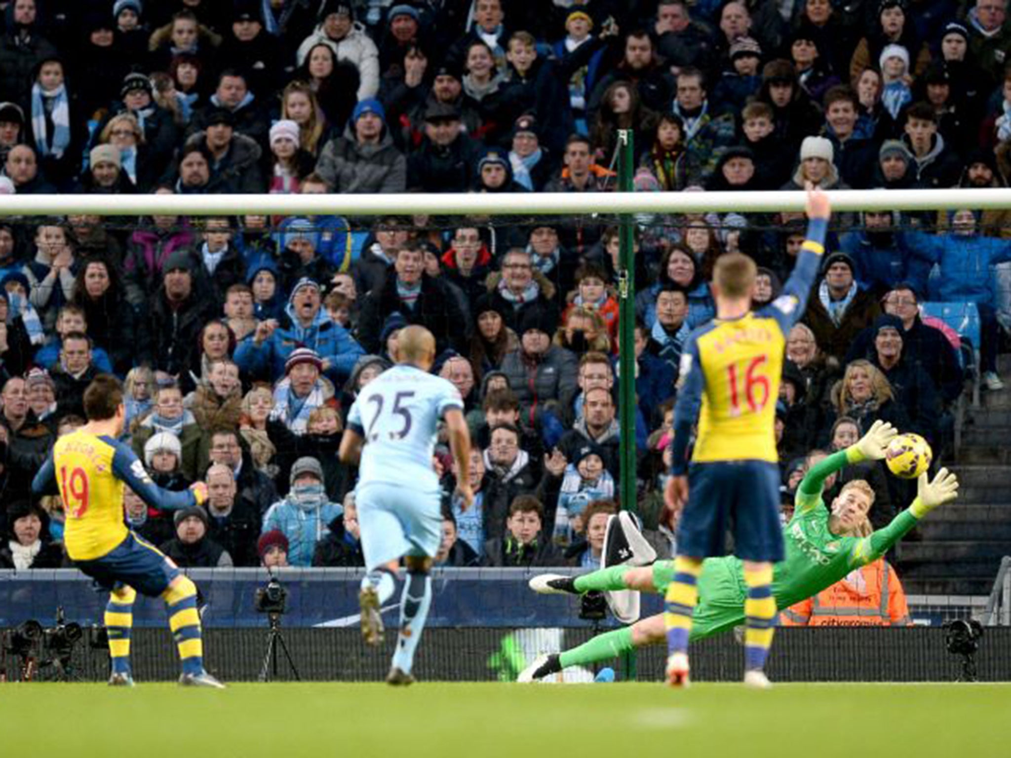 Santi Cazorla scores from the spot (PA)