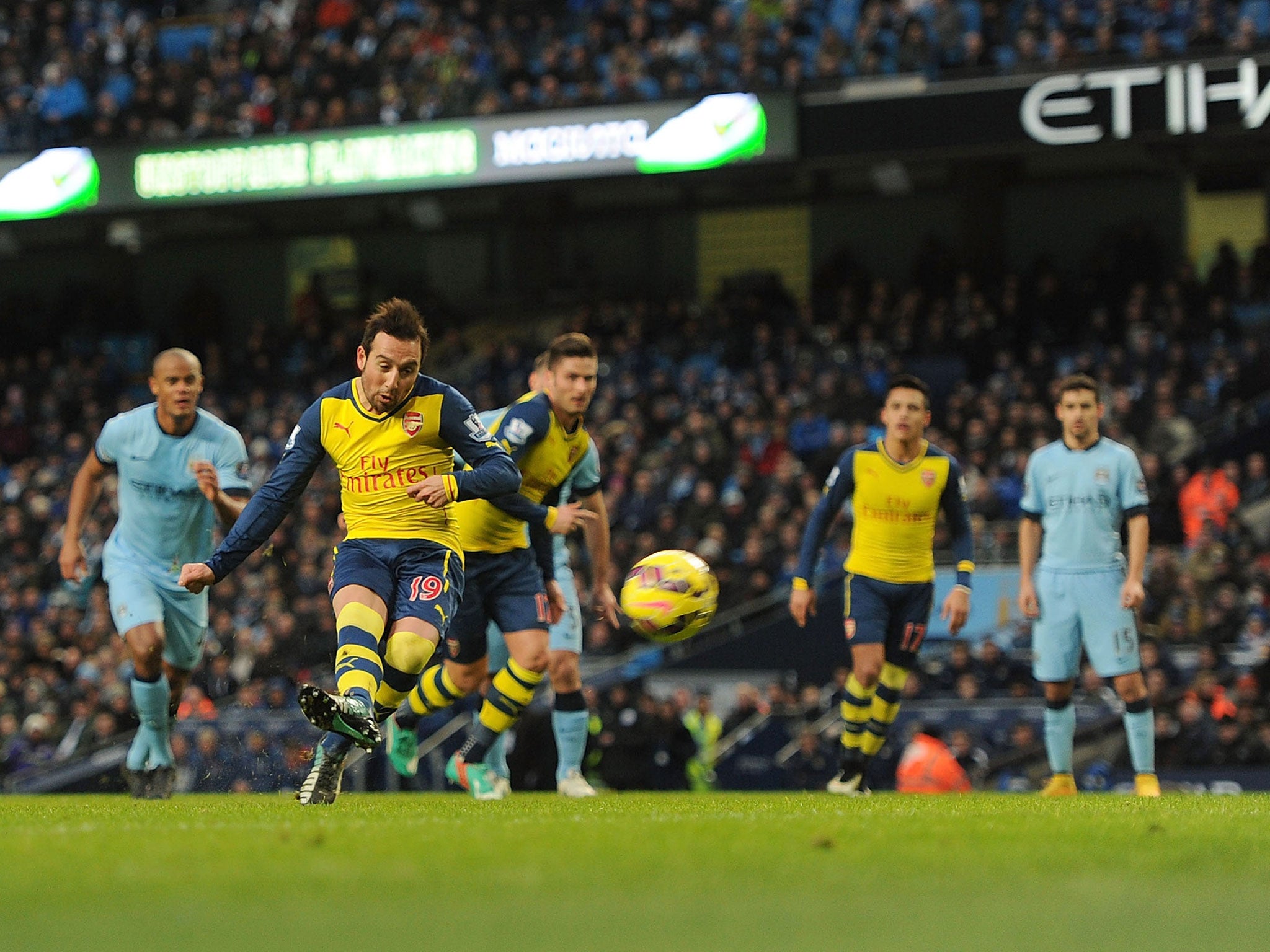 Santi Cazorla scores from the penalty spot