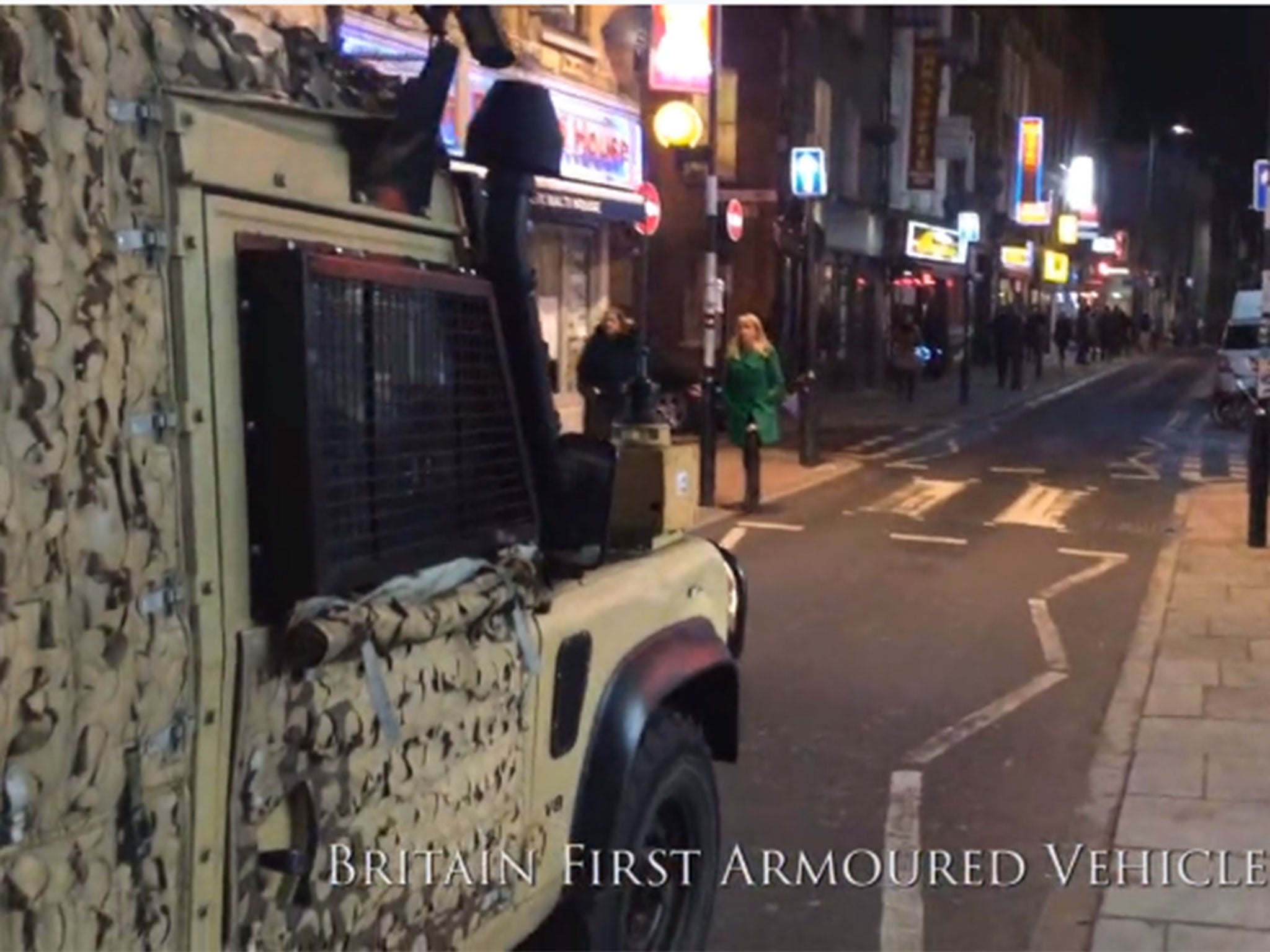 A still from the Britain First video shows one of its two ex-Army issue Land Rovers