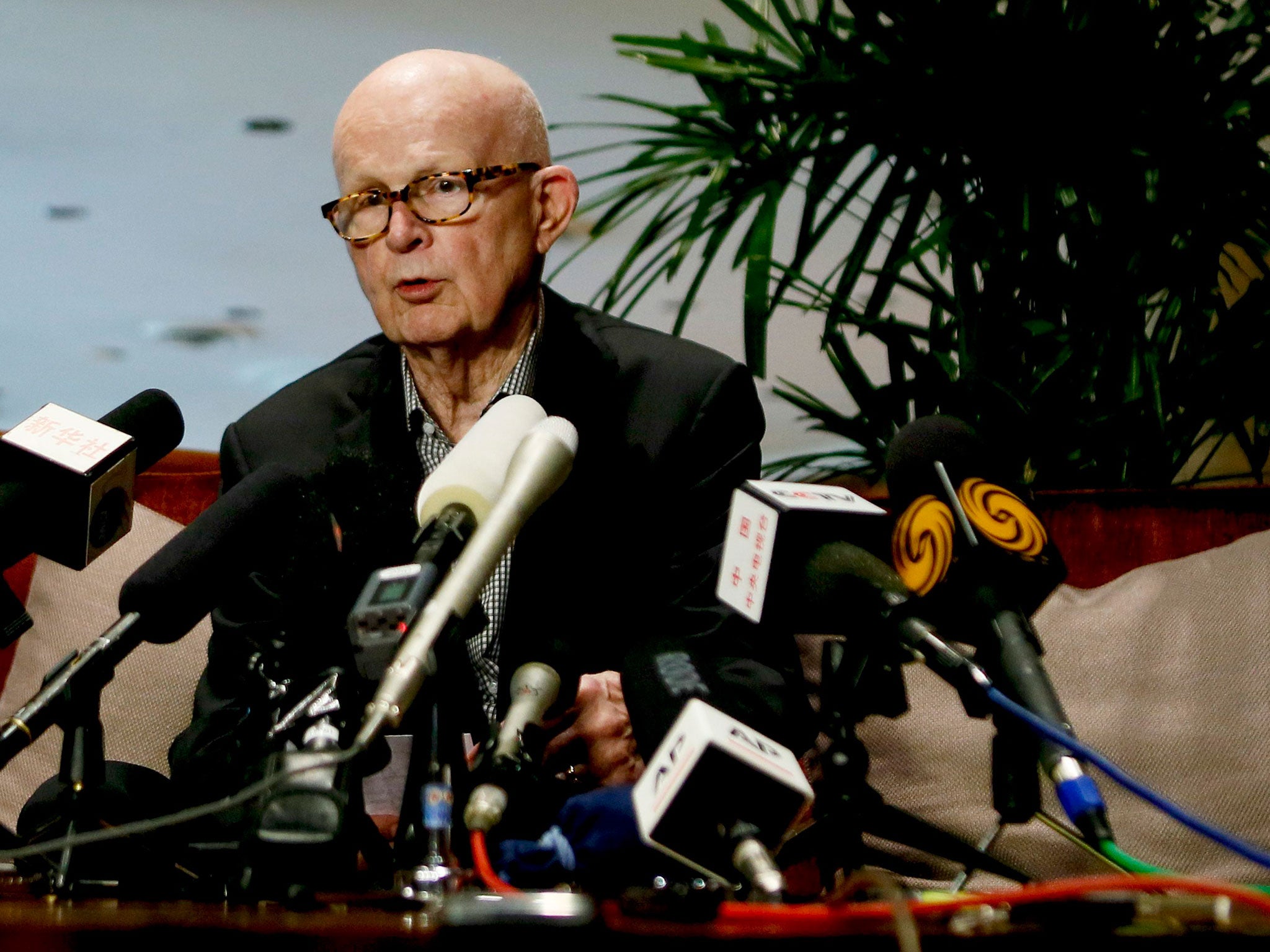 Former US envoy for North Korea policy Stephen Bosworth speaks to reporters at a hotel lobby in Singapore