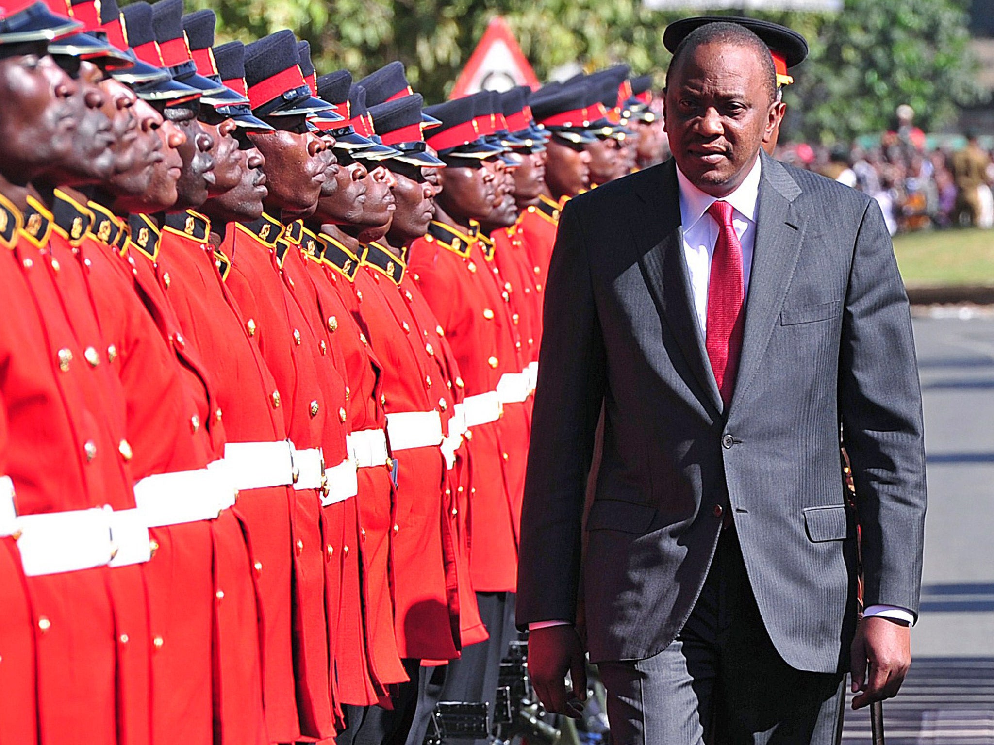 Kenyan President Uhuru Kenyatta receives a guard of honour in Nairobi last year