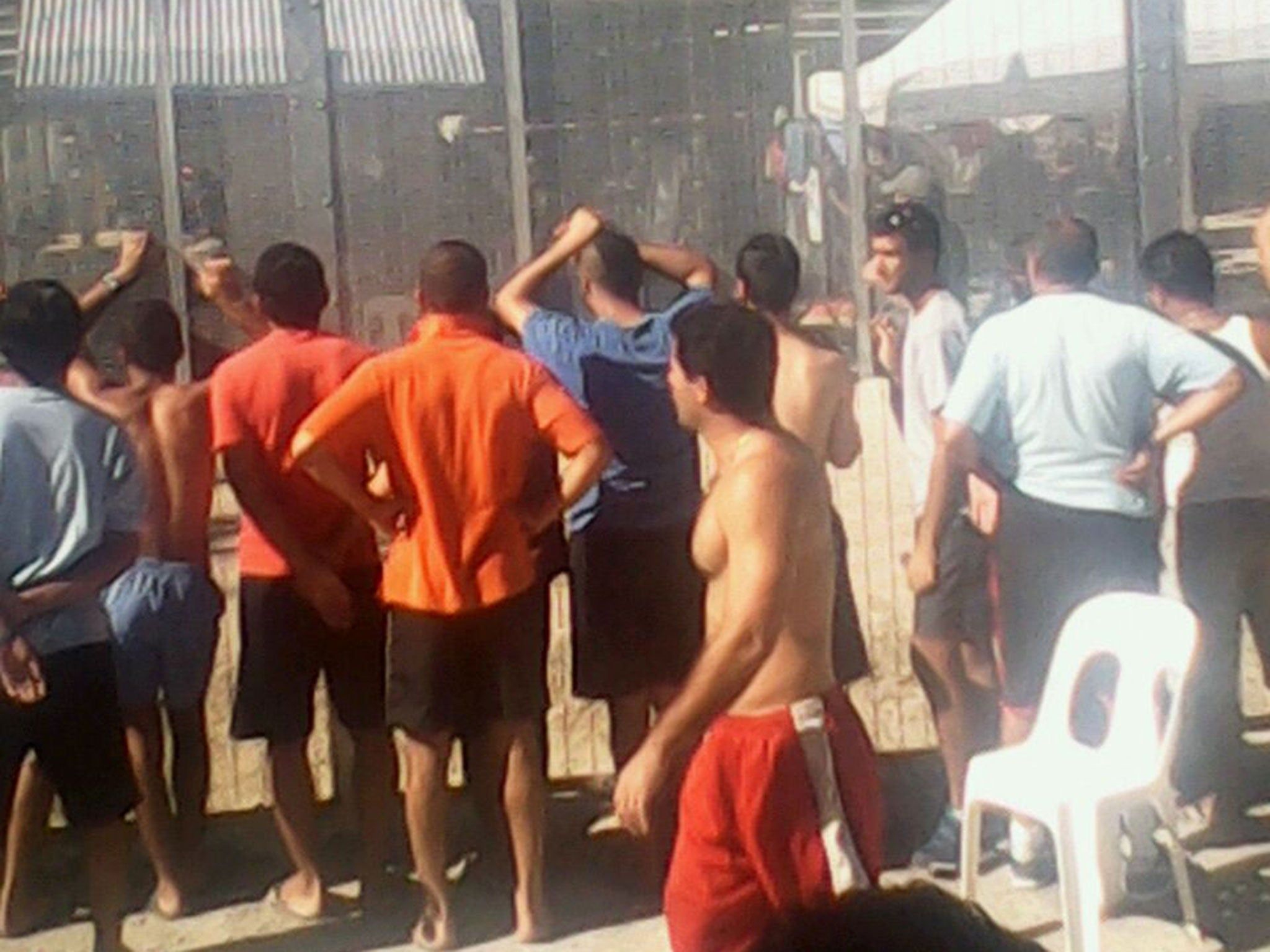 Guards outside Delta before the raid