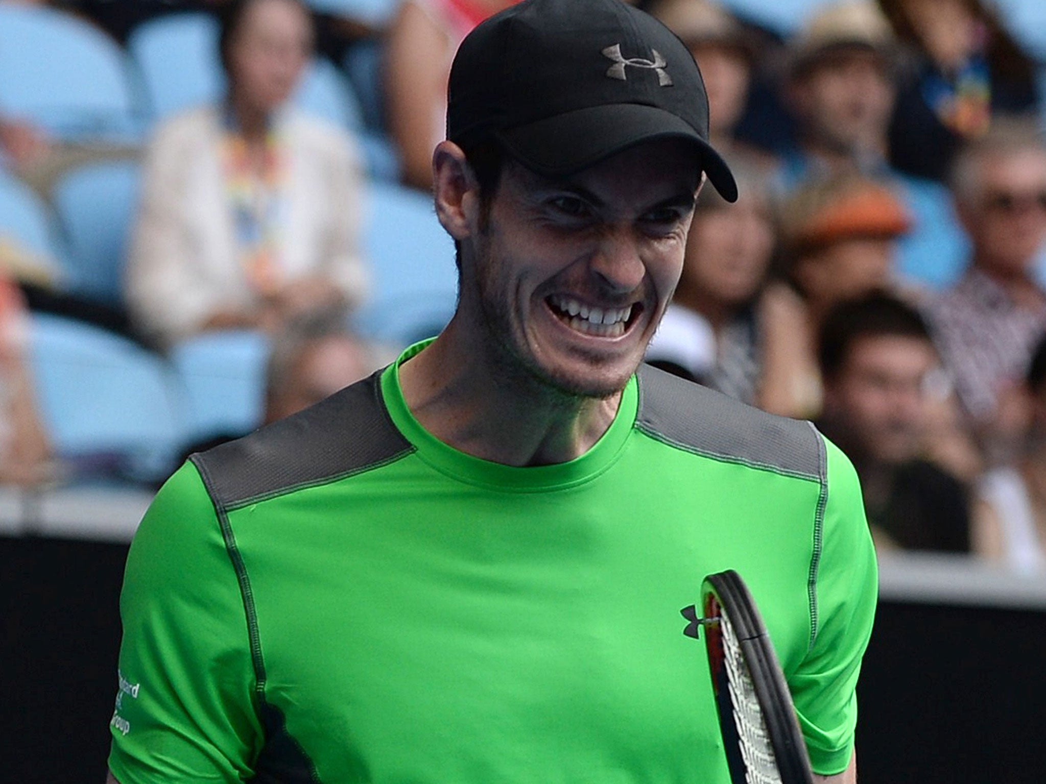 Britain's Andy Murray reacts after a point against Australia's Marinko Matosevic