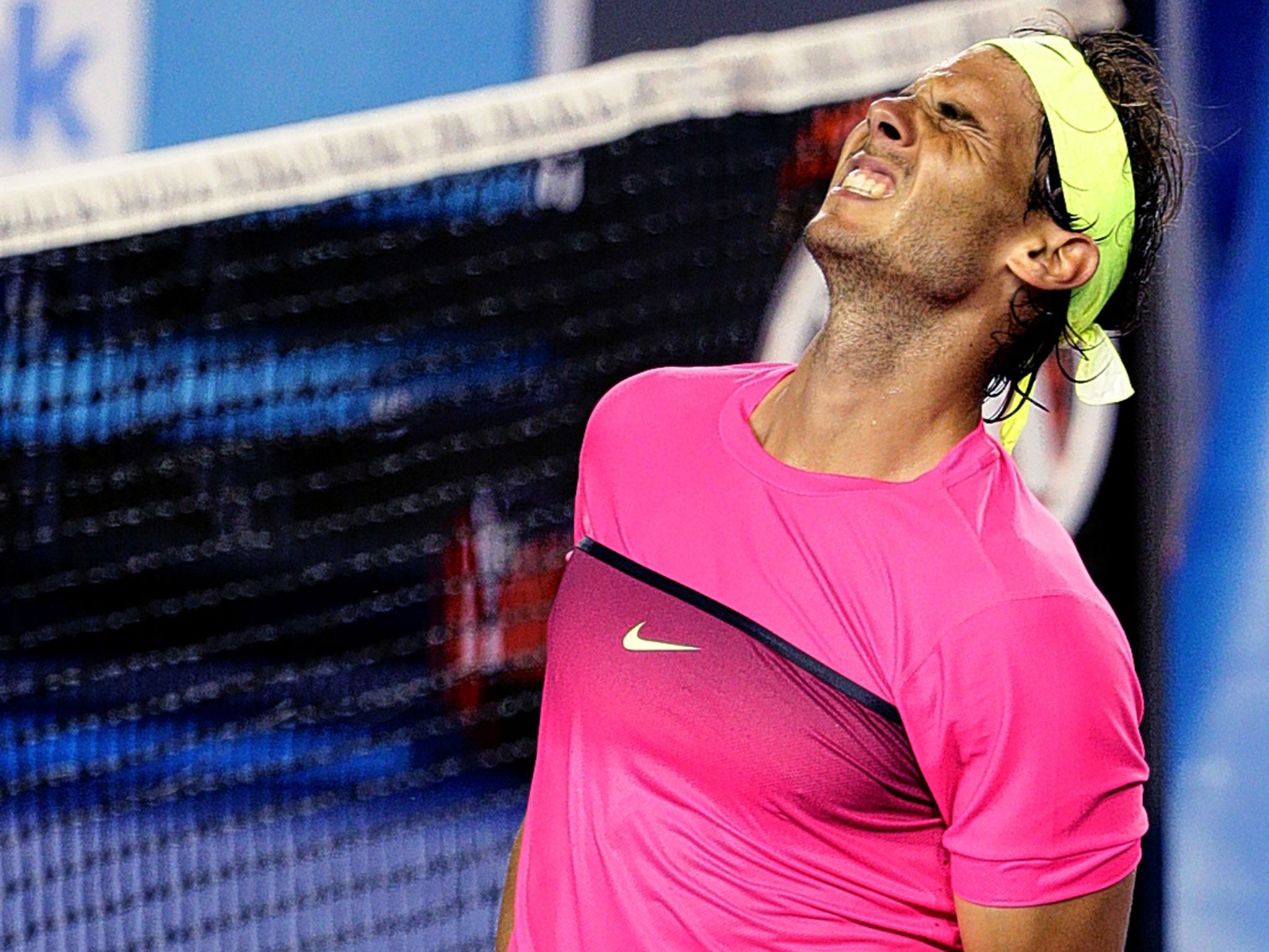 Rafael Nadal sinks to his knees after beating Tim Smyczek in five sets