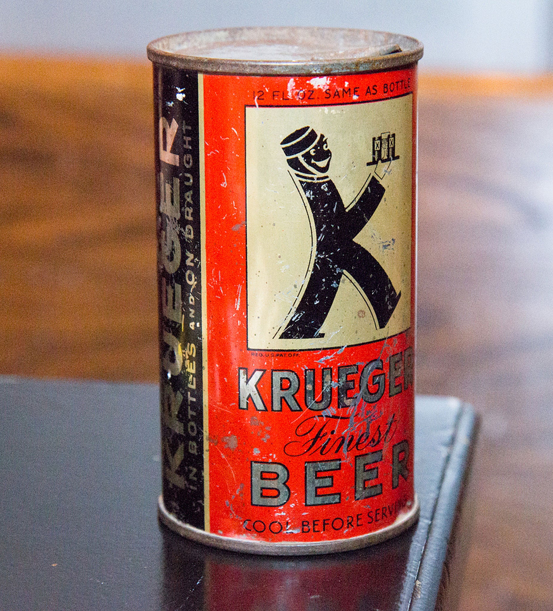 Following a successul experiment with canning machinery, the figure that appeared on Krueger's cans (Mr K) was redrawn with an enormous grin