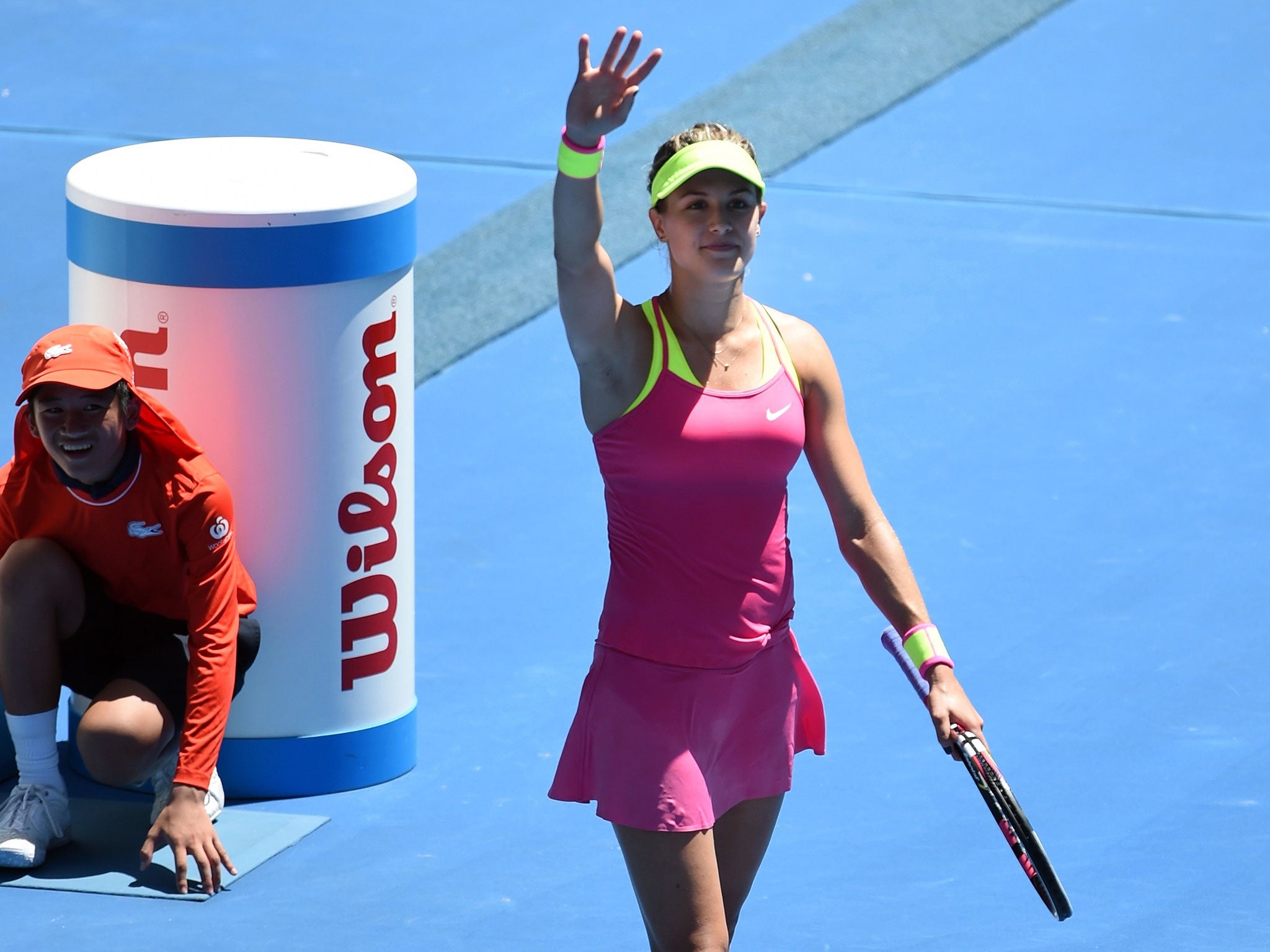 Bouchard waves to the crowd following her victory over Caroline Garcia