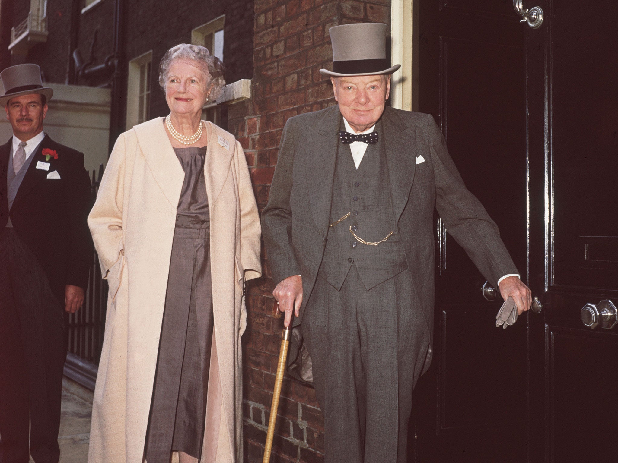 Winston and Lady Churchill leaving their Hyde Park Gate home for an Ascot race meeting on 16 June 1961