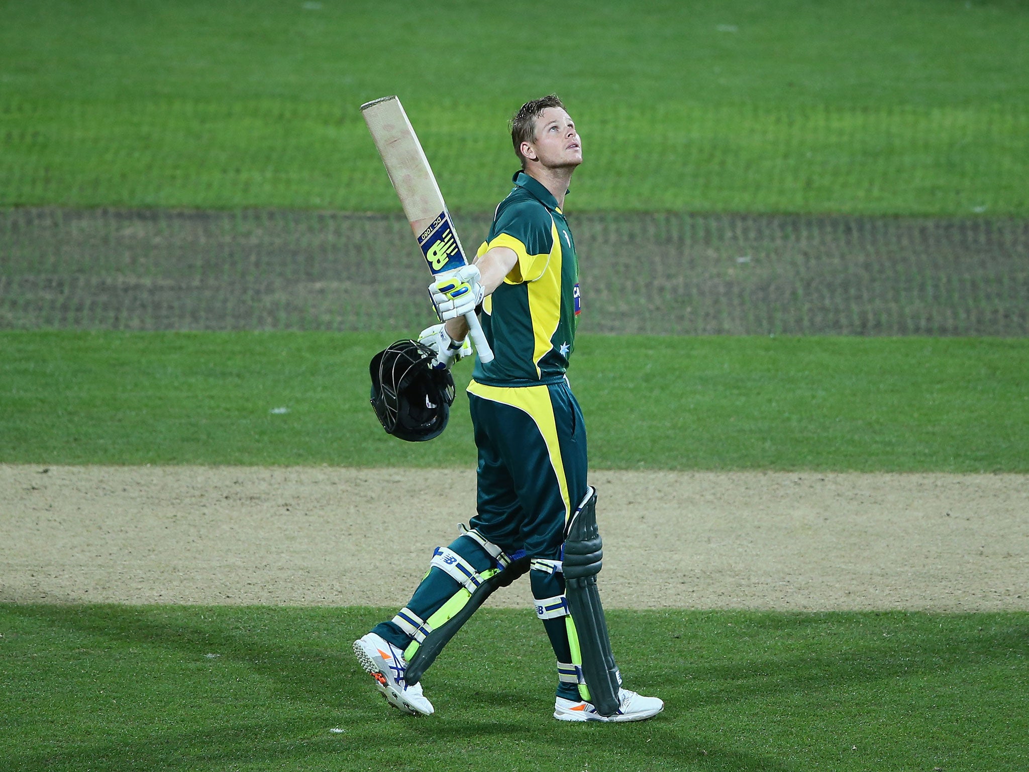 Steve Smith celebrates his century as he looks to the skies