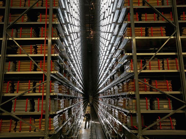 Resident engineer John Roberts poses as he looks at the millions of newspapers stored on racks at the National Newspaper Archive in Boston Spa. The British Library's brand new National Newspaper Building has officially opened. The newly built storage void