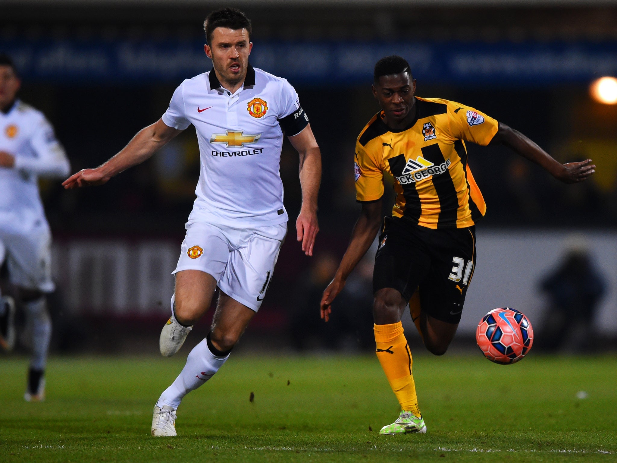 Michael Carrick (left) is out injured