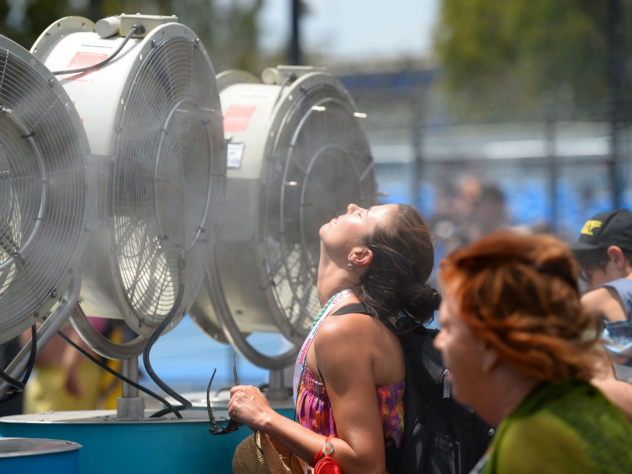 Fans trying to cool off with mist during the 2014 Australian Open