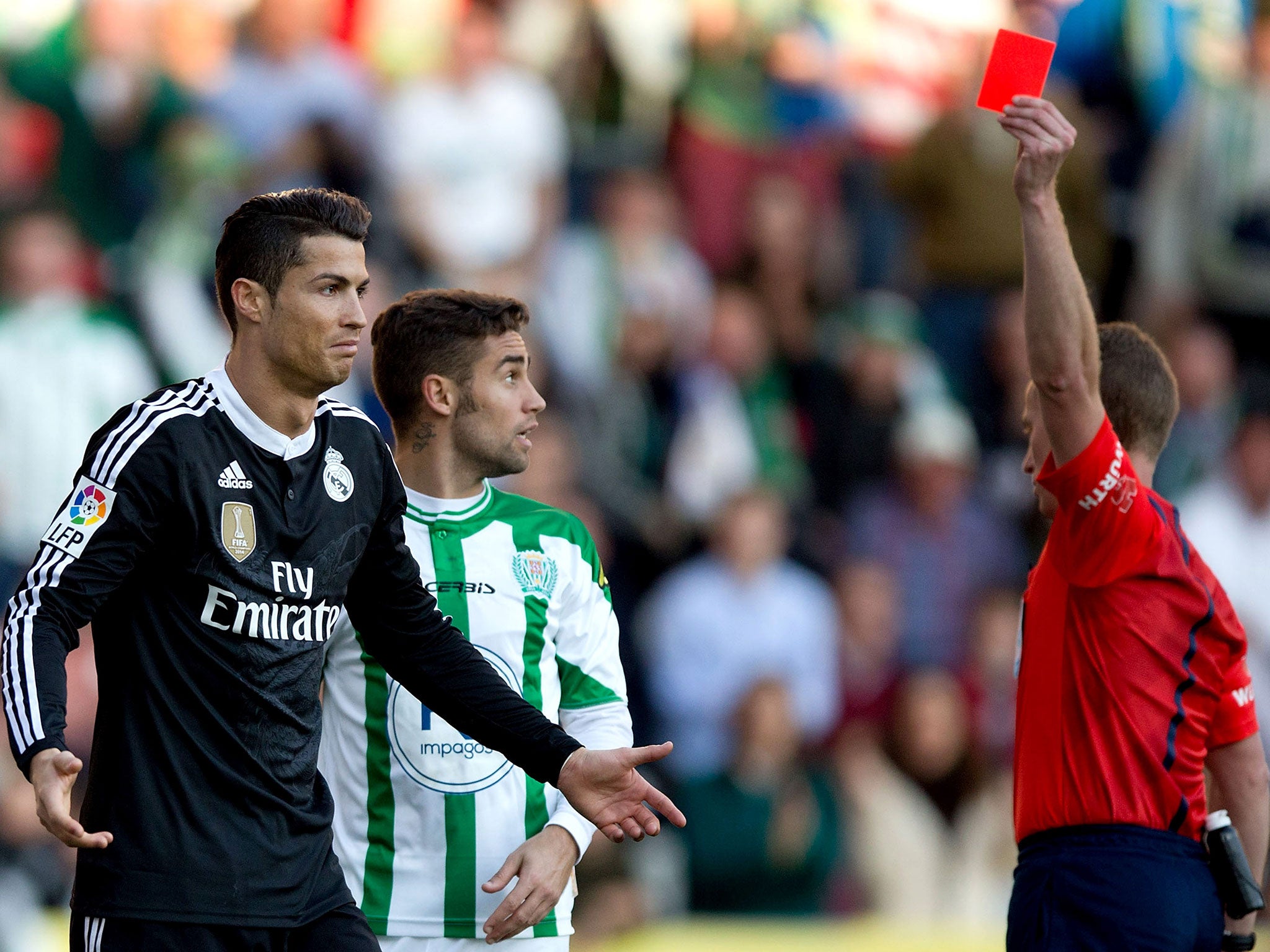 Cristiano Ronaldo is shown a red card