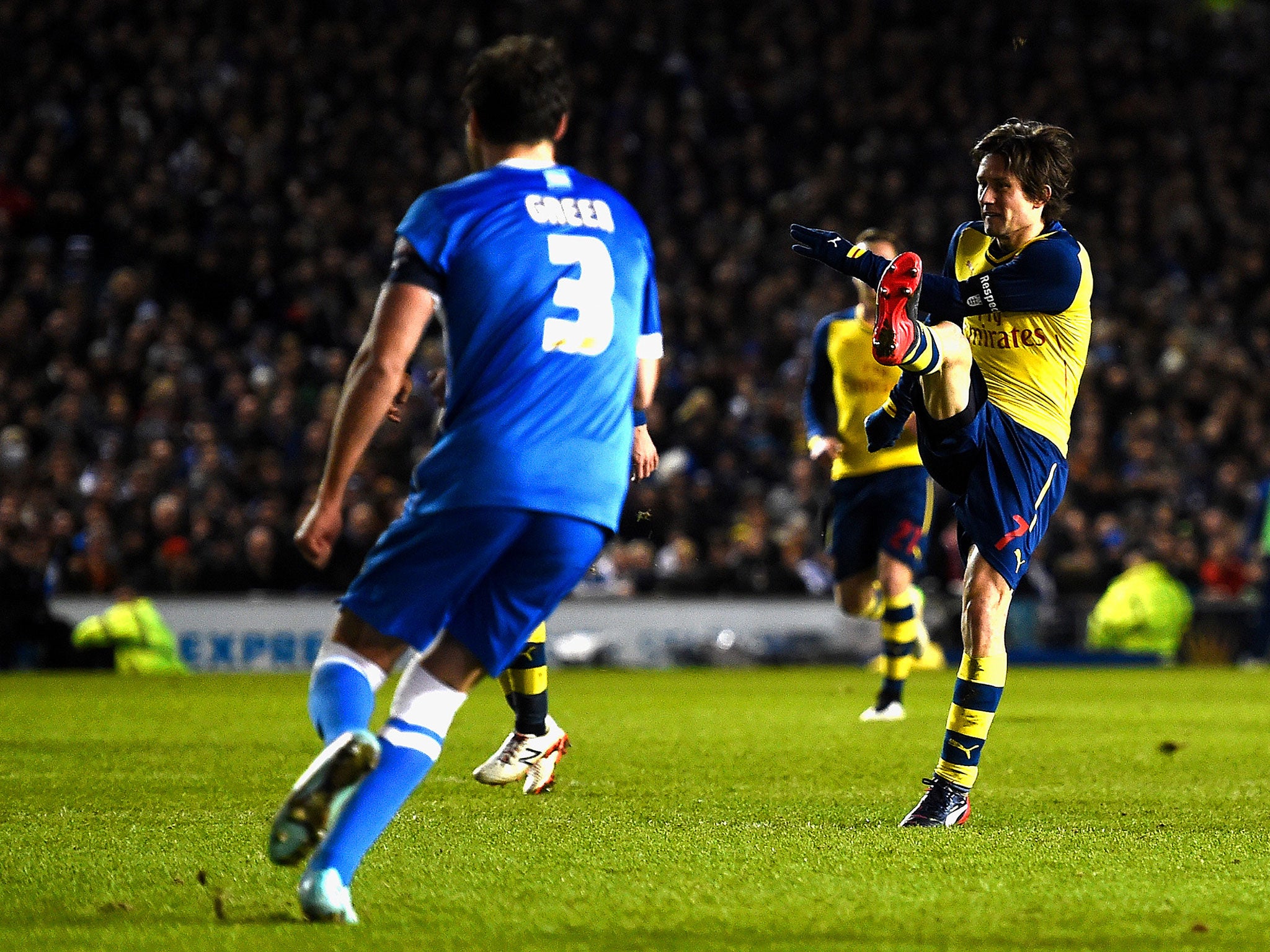 Tomas Rosicky volleys in Arsenal's third