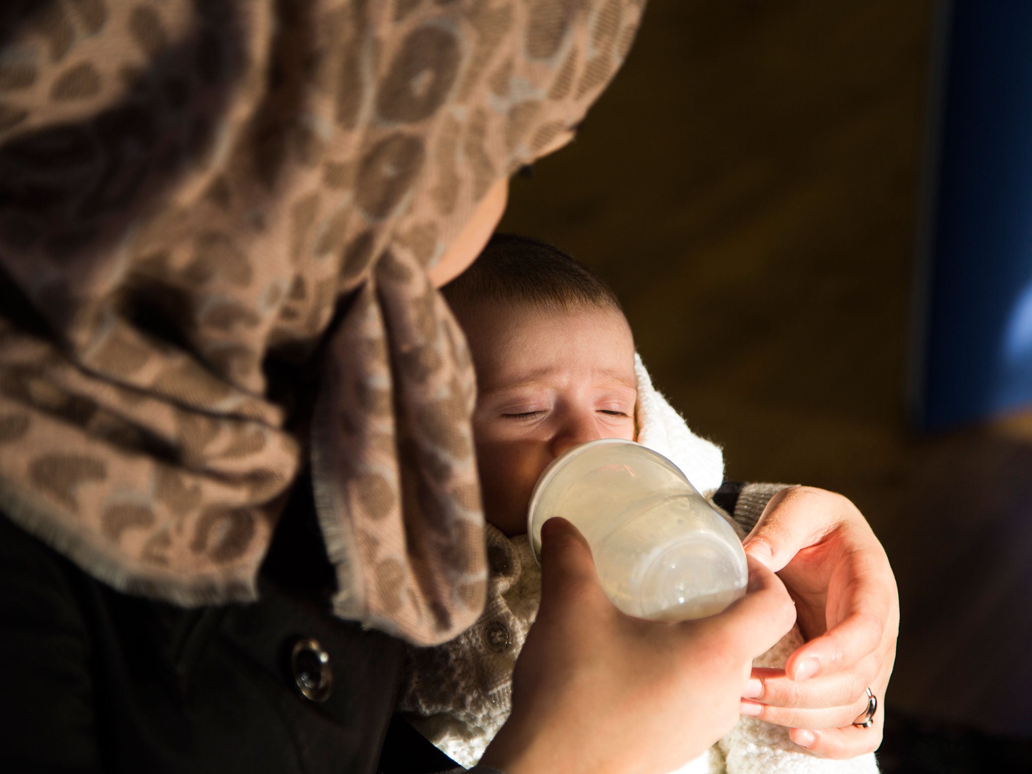 Syrian refugee ‘Nour’ with her two month-old daughter. She was one of the first Syrians to come to the UK a year ago when the Government agreed to resettle ‘several hundred’ people under the Vulnerable Persons Relocation scheme