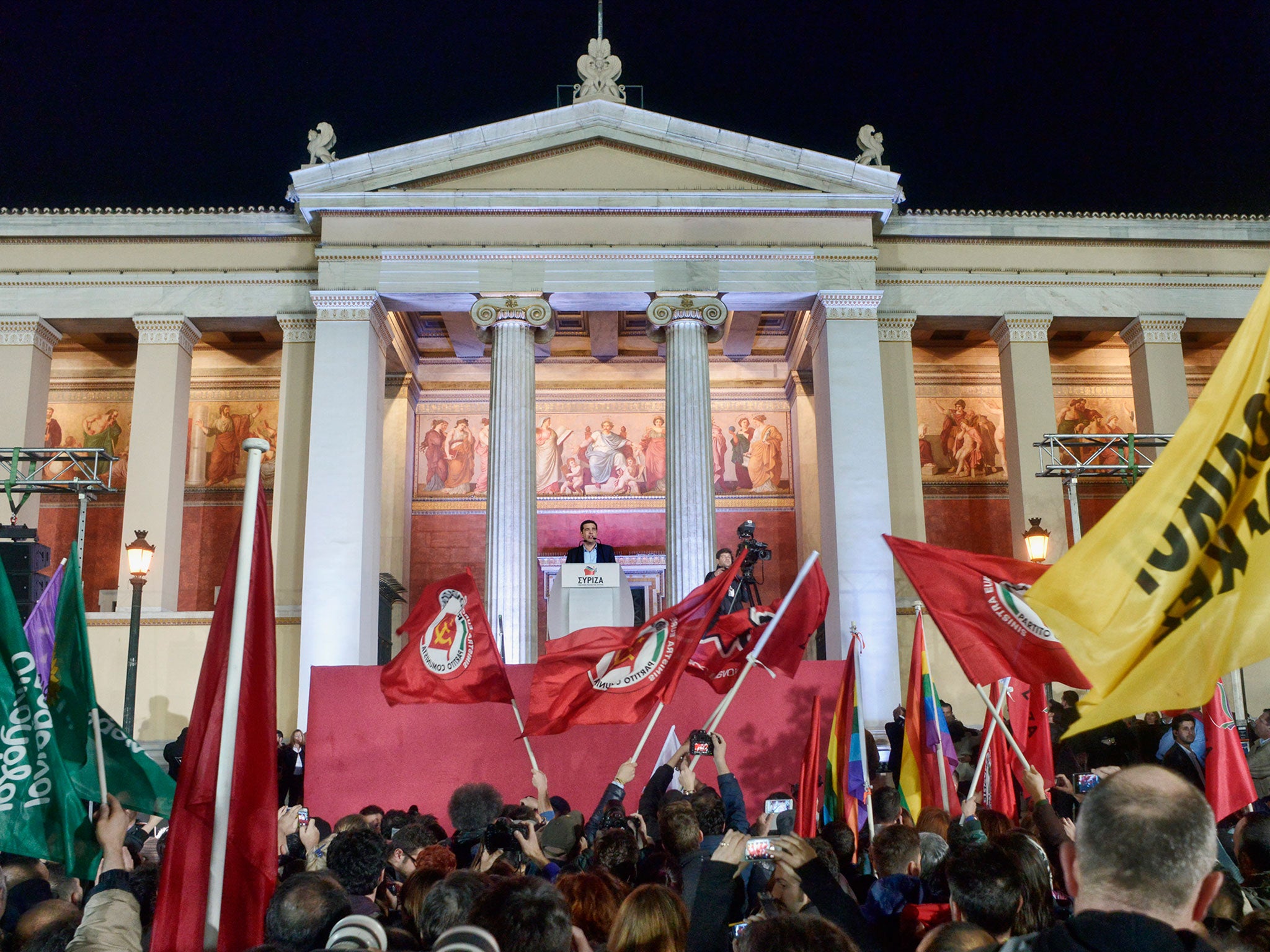 Alexis Tsipras, leader of Syriza left-wing party, speaks during a rally outside Athens University Headquarters in Athens