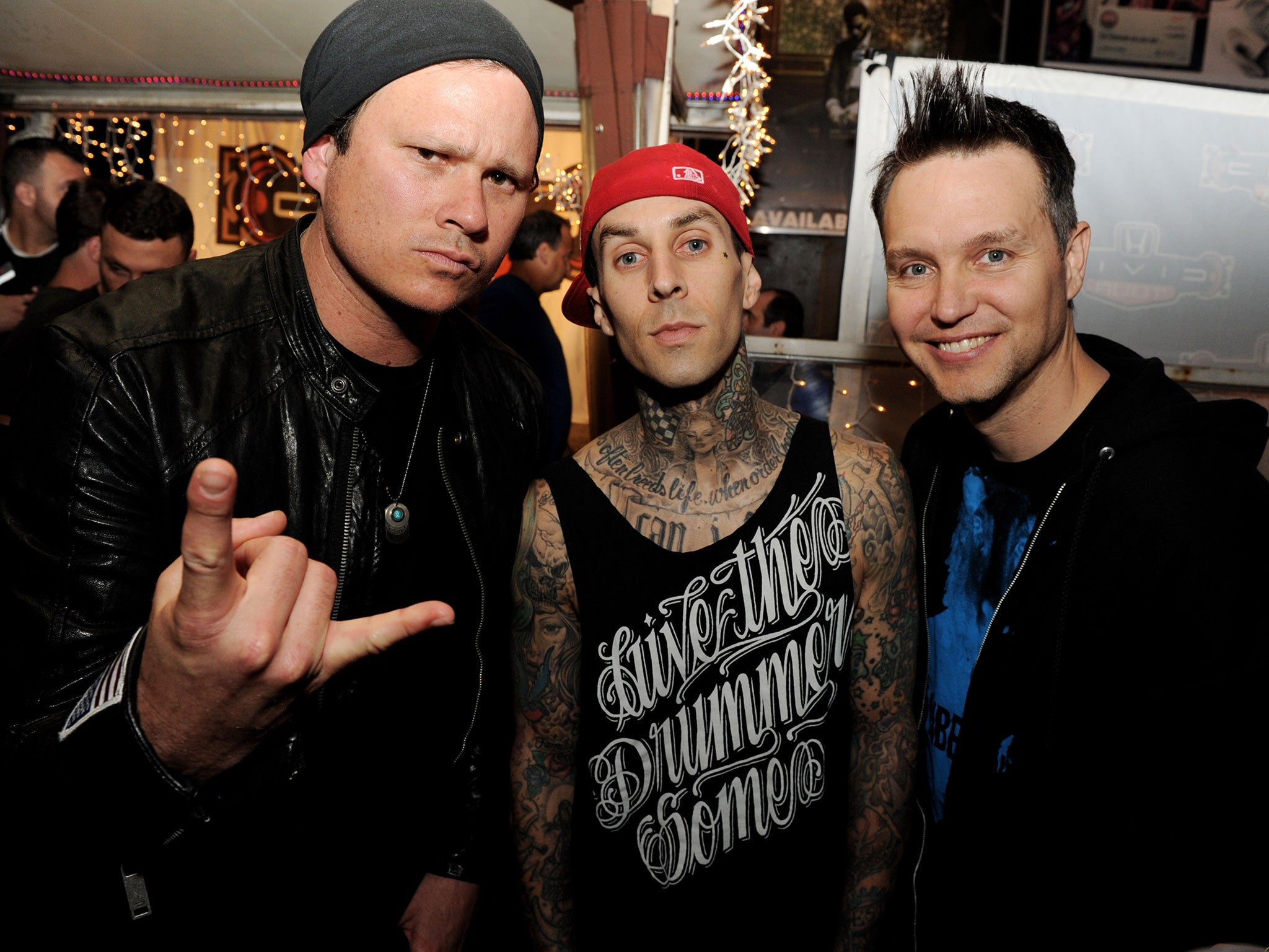 Tom DeLonge, Travis Barker and Mark Hoppus of Blink-182 pictured in 2011. (Getty Images)