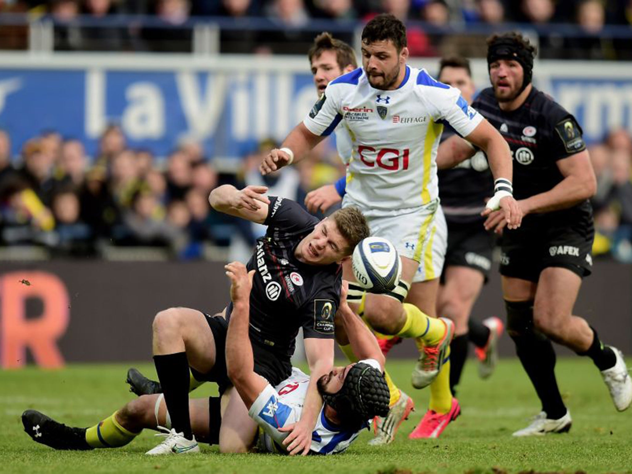 Owen Farrell (in black) is a concern for England after injuring his knee playing for Saracens at Clermont Auvergne on Sunday (Getty)