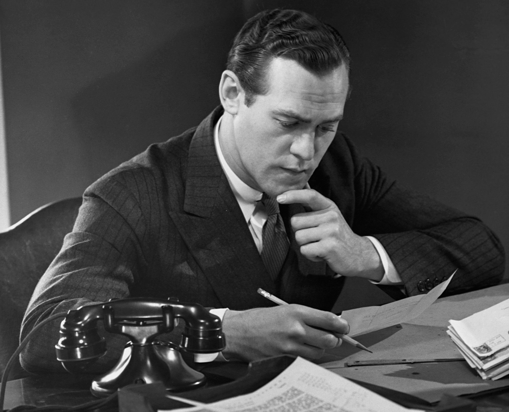 Businessman at desk circa 1950s