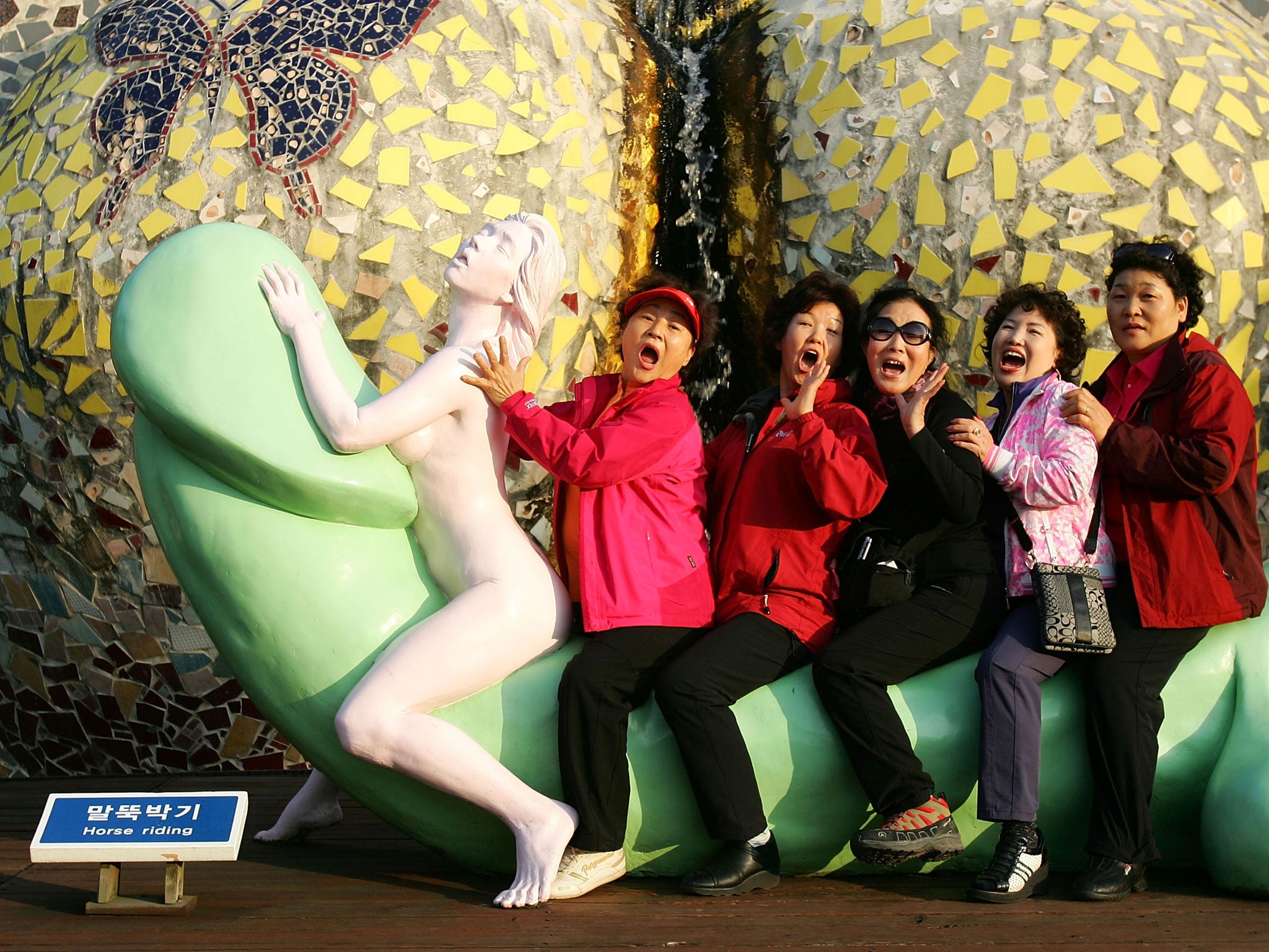 People visit the theme park 'Love Land' on October 24, 2009 in Jeju, South Korea.