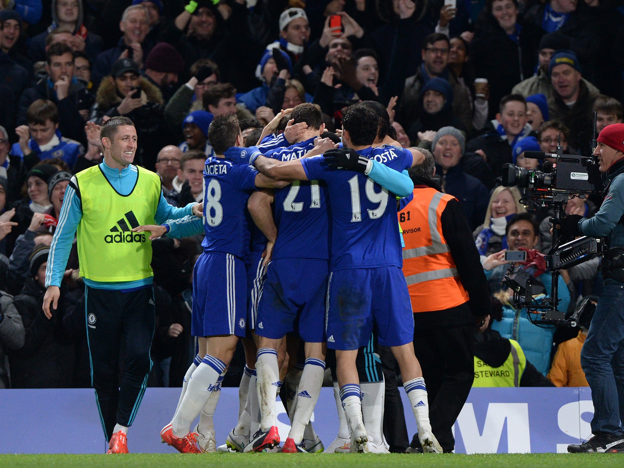 Chelsea players celebrate a famous win