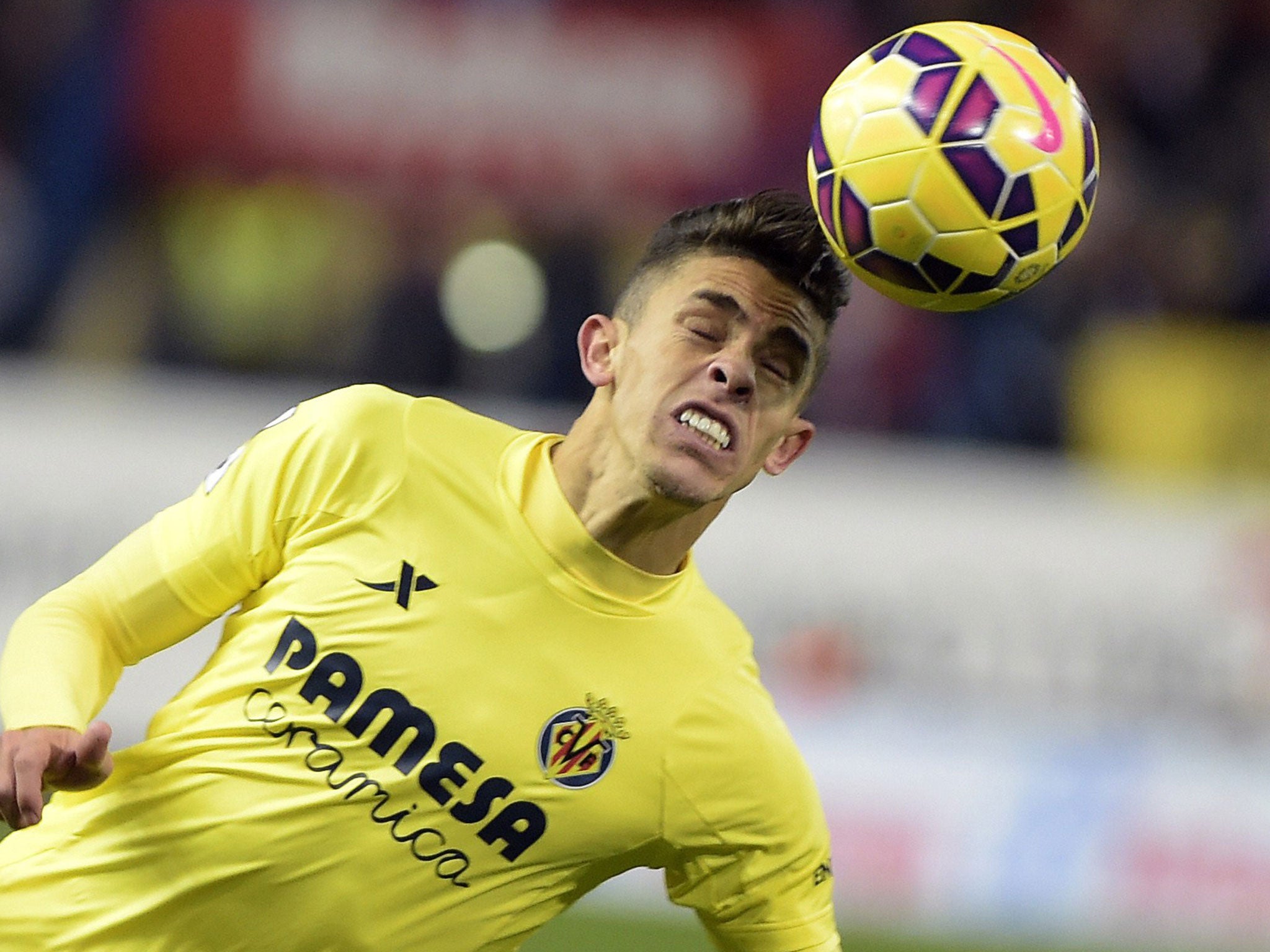 Gabriel Paulista makes a headed clearance