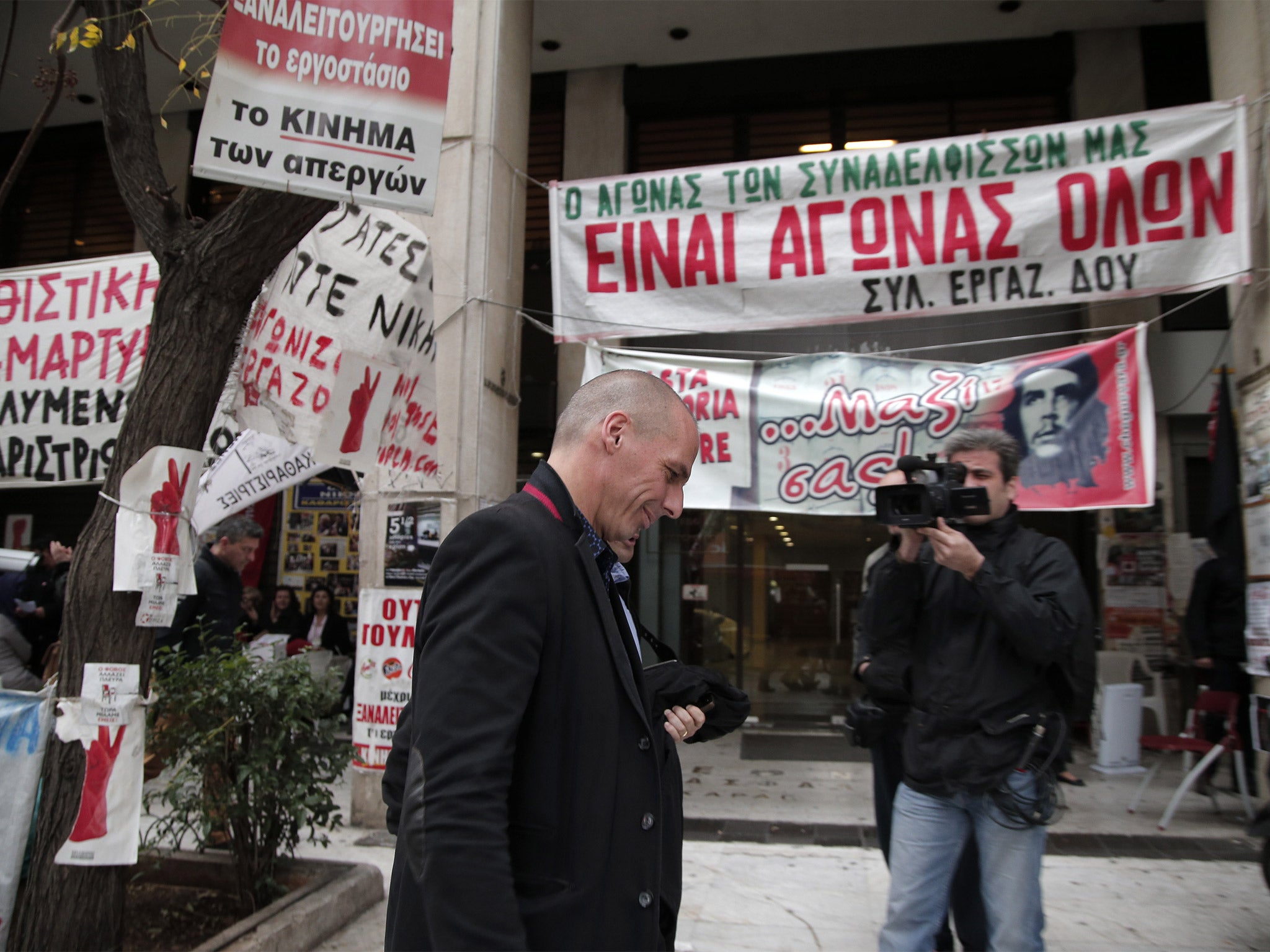 The Finance Minister Yanis Varoufakis at a protest site for cleaning workers laid off by the Finance Ministry in Athens