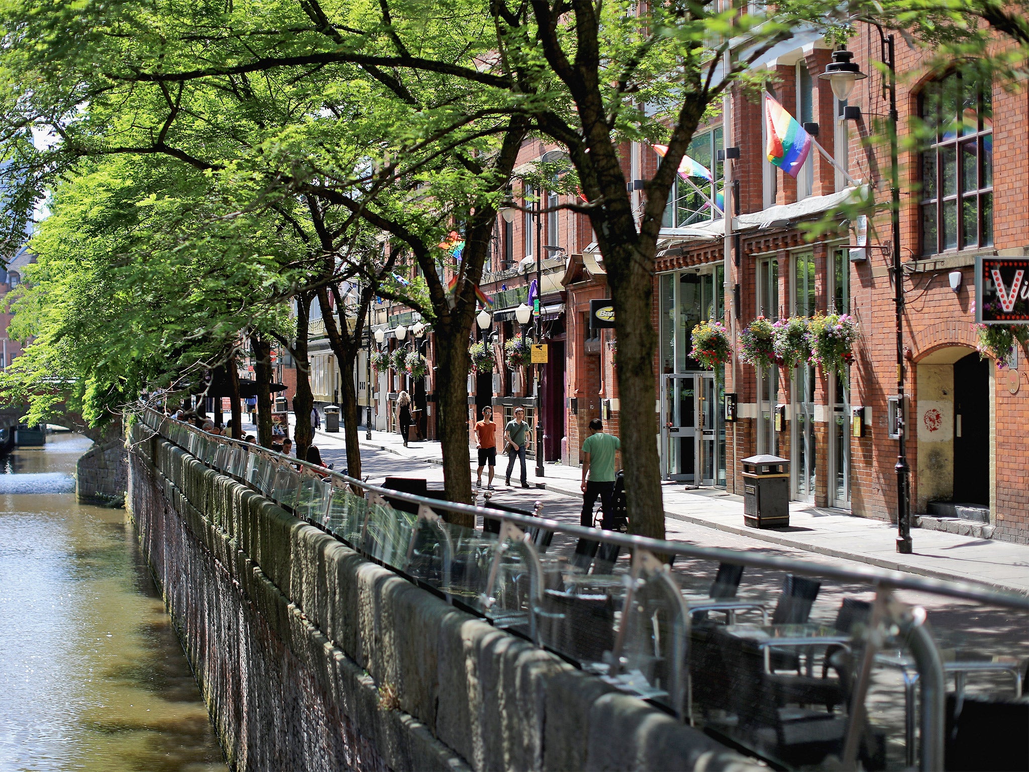 Canal Street in Manchester city centre. The area is surrounded by remnants of the past and the Industrial Revolution