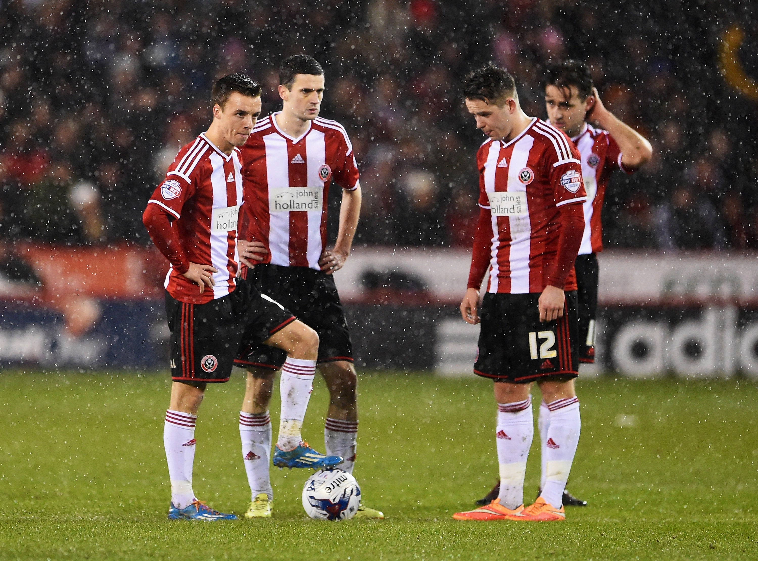 Sheffield United players react