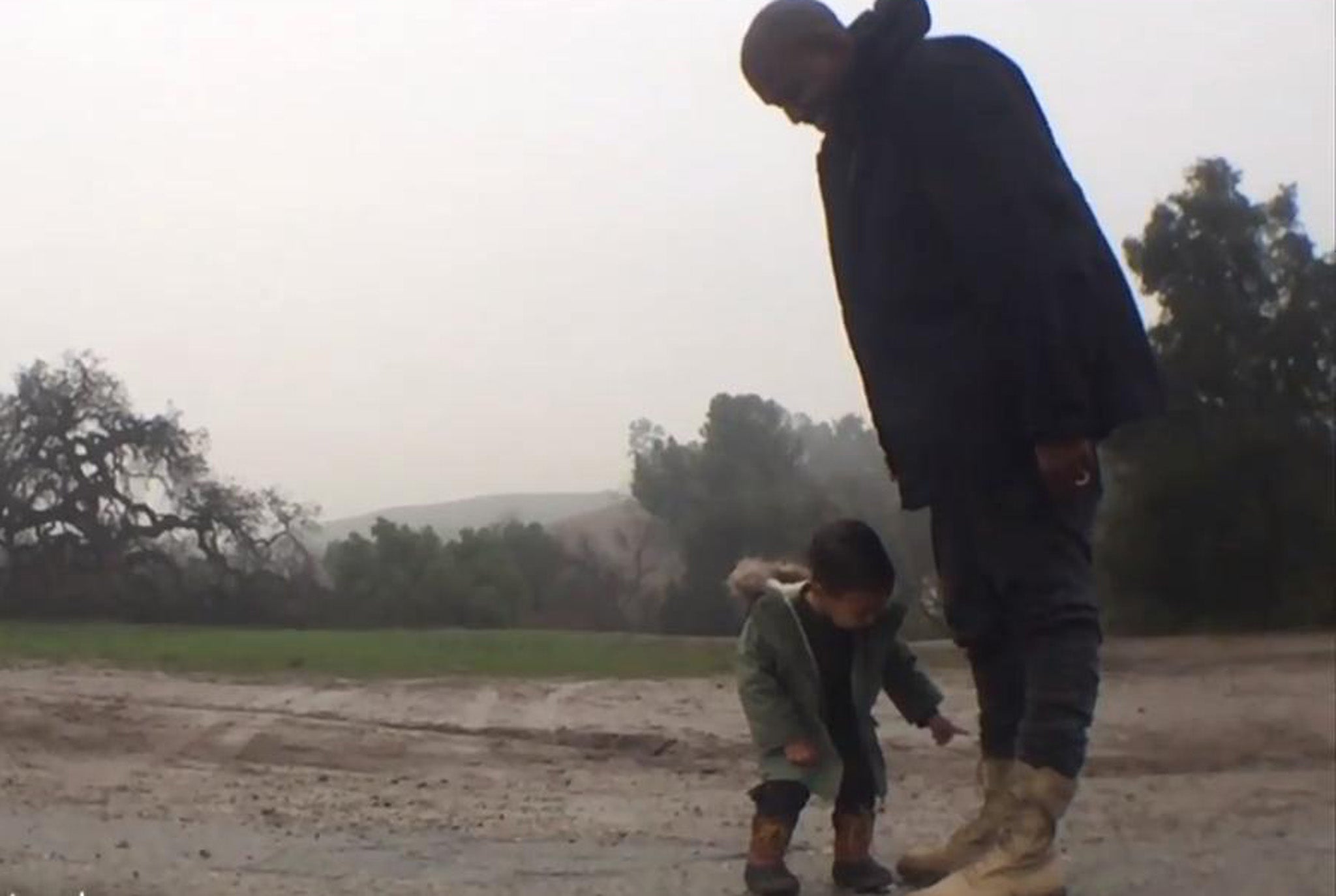 Kanye West and his daughter North in his new video for 'Only One'