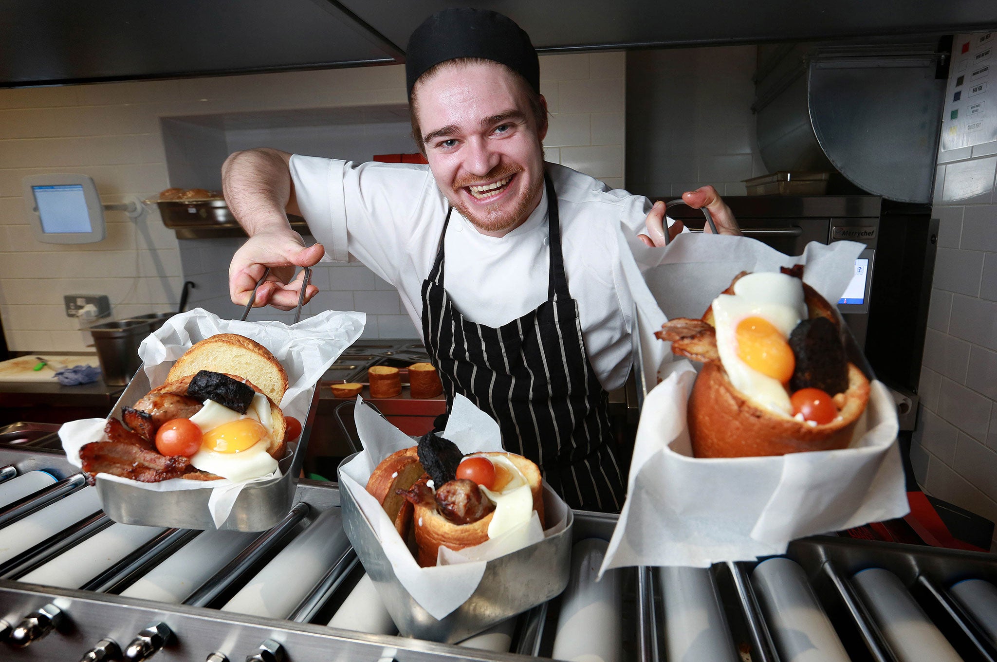 Television chef Phil Vickery presents the 2015 Best Breakfast Award for the UK's Most Innovative Breakfast at Bunnychow in Wardour Street in London