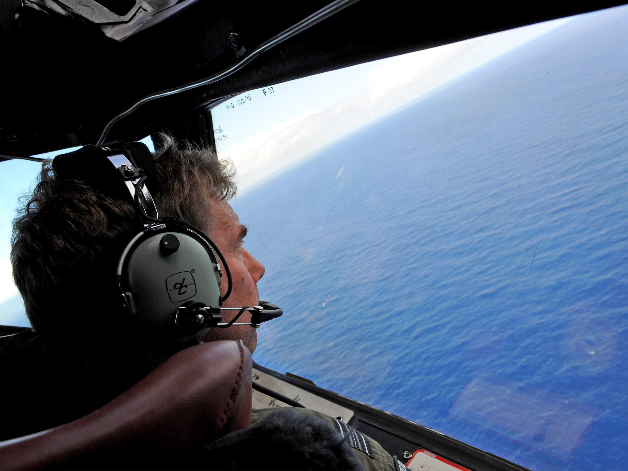 An Australian pilot searches the South Indian Ocean for the flight