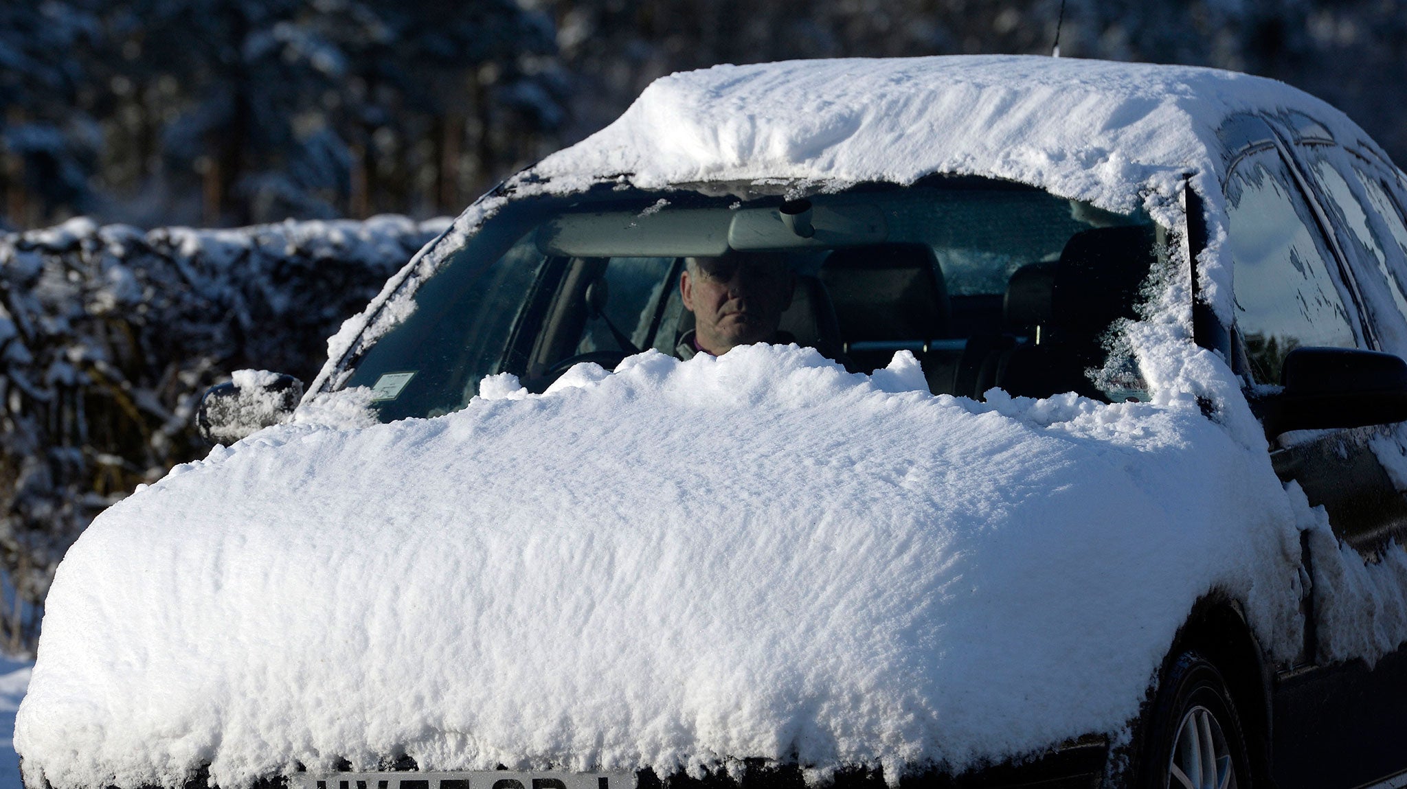 A car covered with snow in County Durham