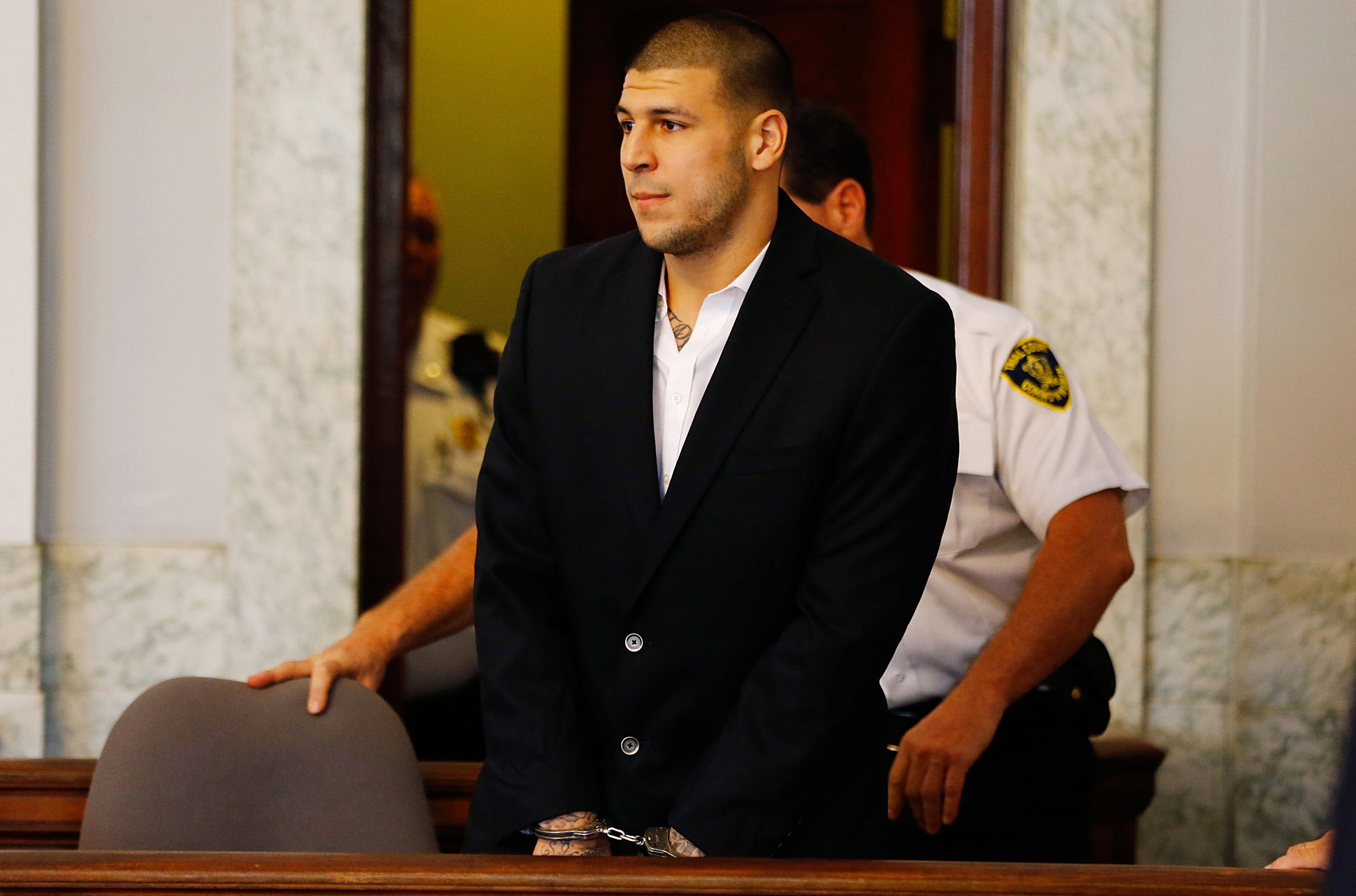 Aaron Hernandez denies three murder charges levelled at him