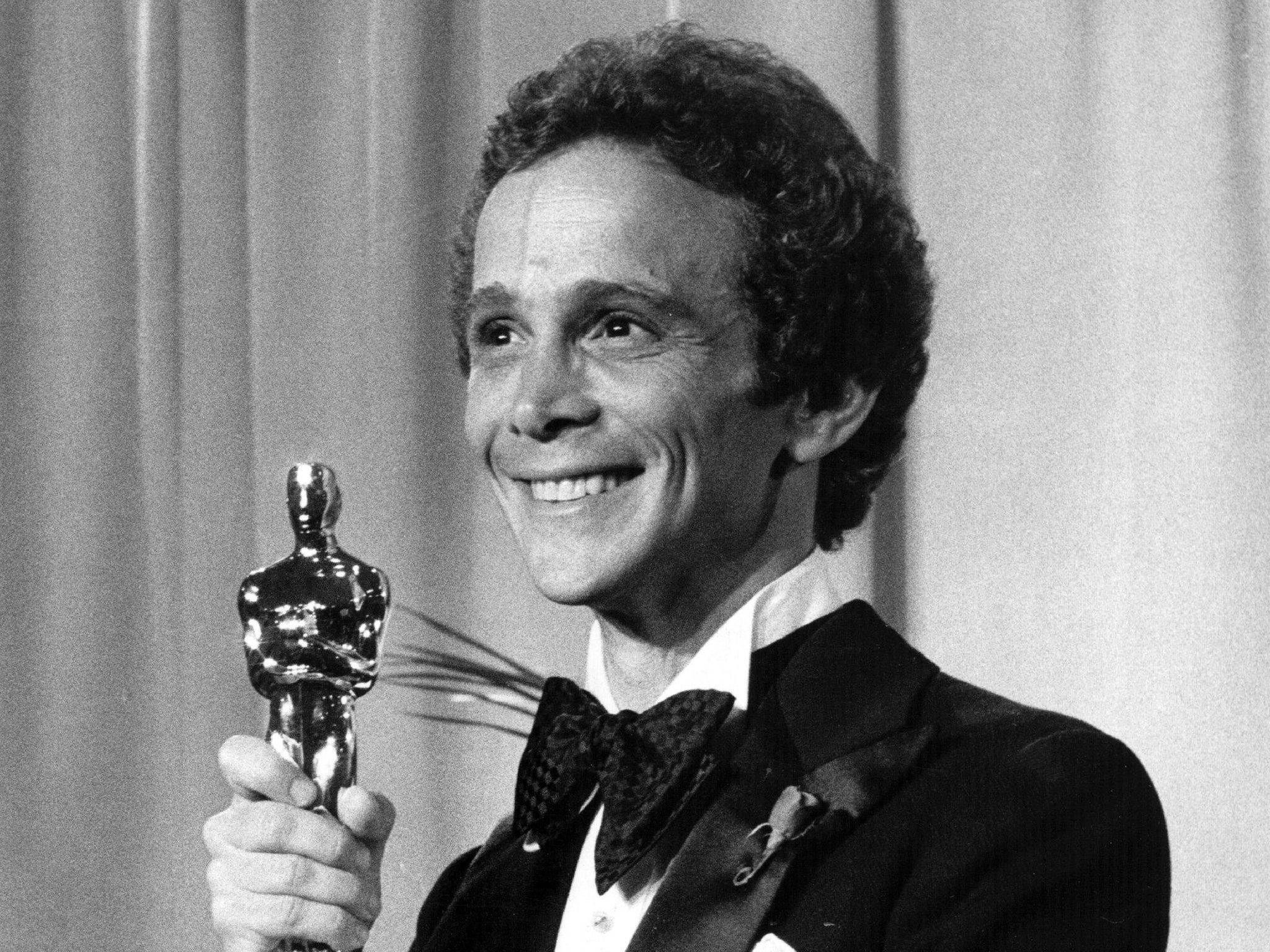 Joel Grey with the Oscar he won for Best Supporting Actor for his role in 'Cabaret' in 1973 (Reuters)