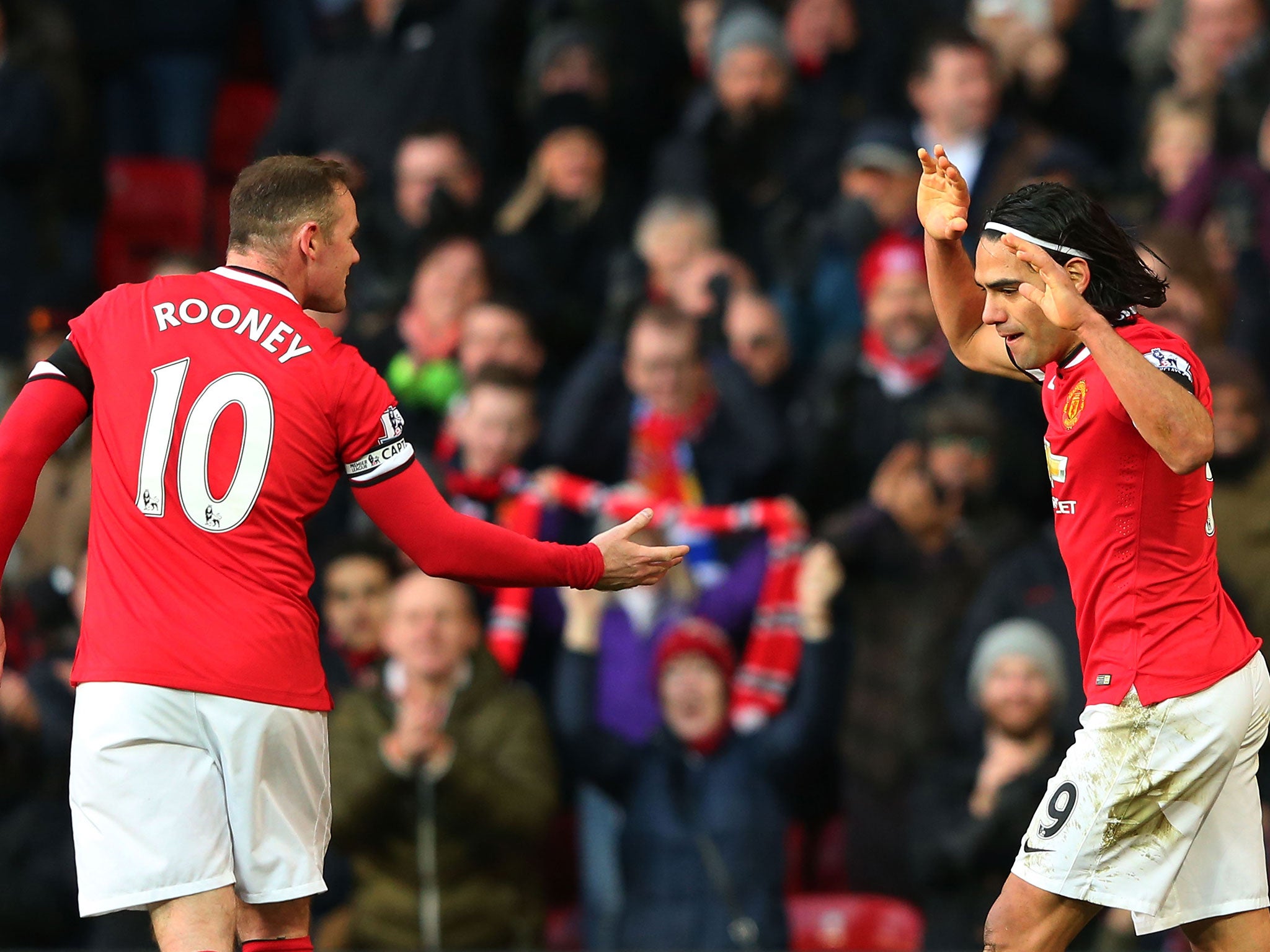 Wayne Rooney celebrates with Radamel Falcao