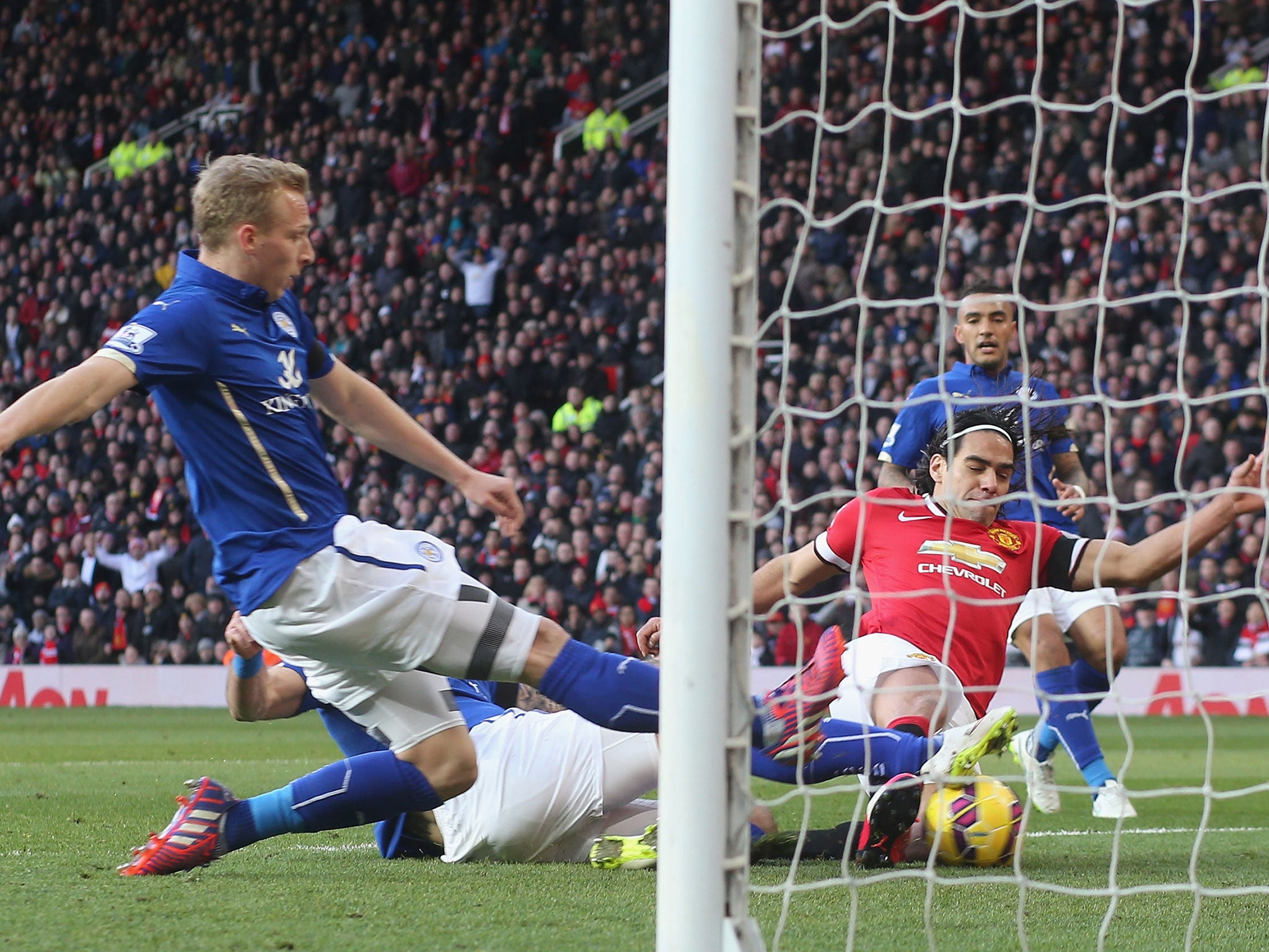 Radamel Falcao stretches to score United's second