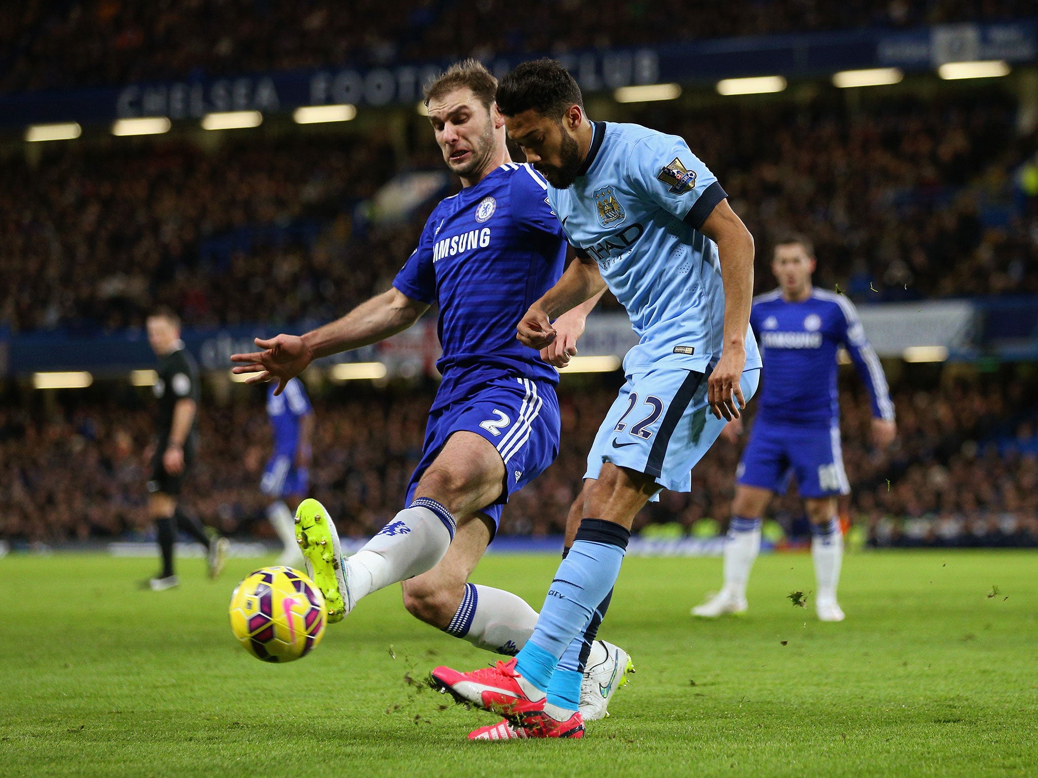 Branislav Ivanovic (left) tackles Gael Clichy on Saturday