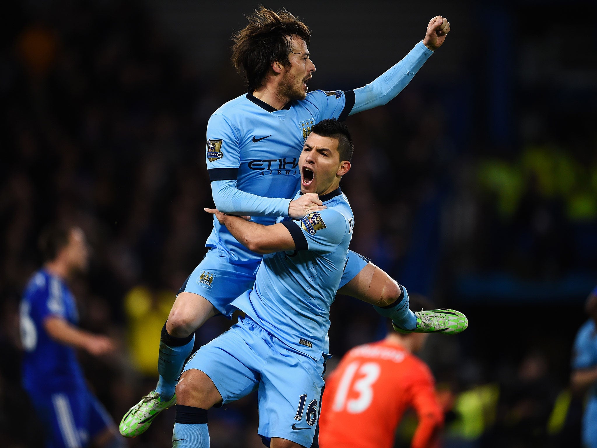 David Silva celebrates with Sergio Aguero after equalising against Chelsea