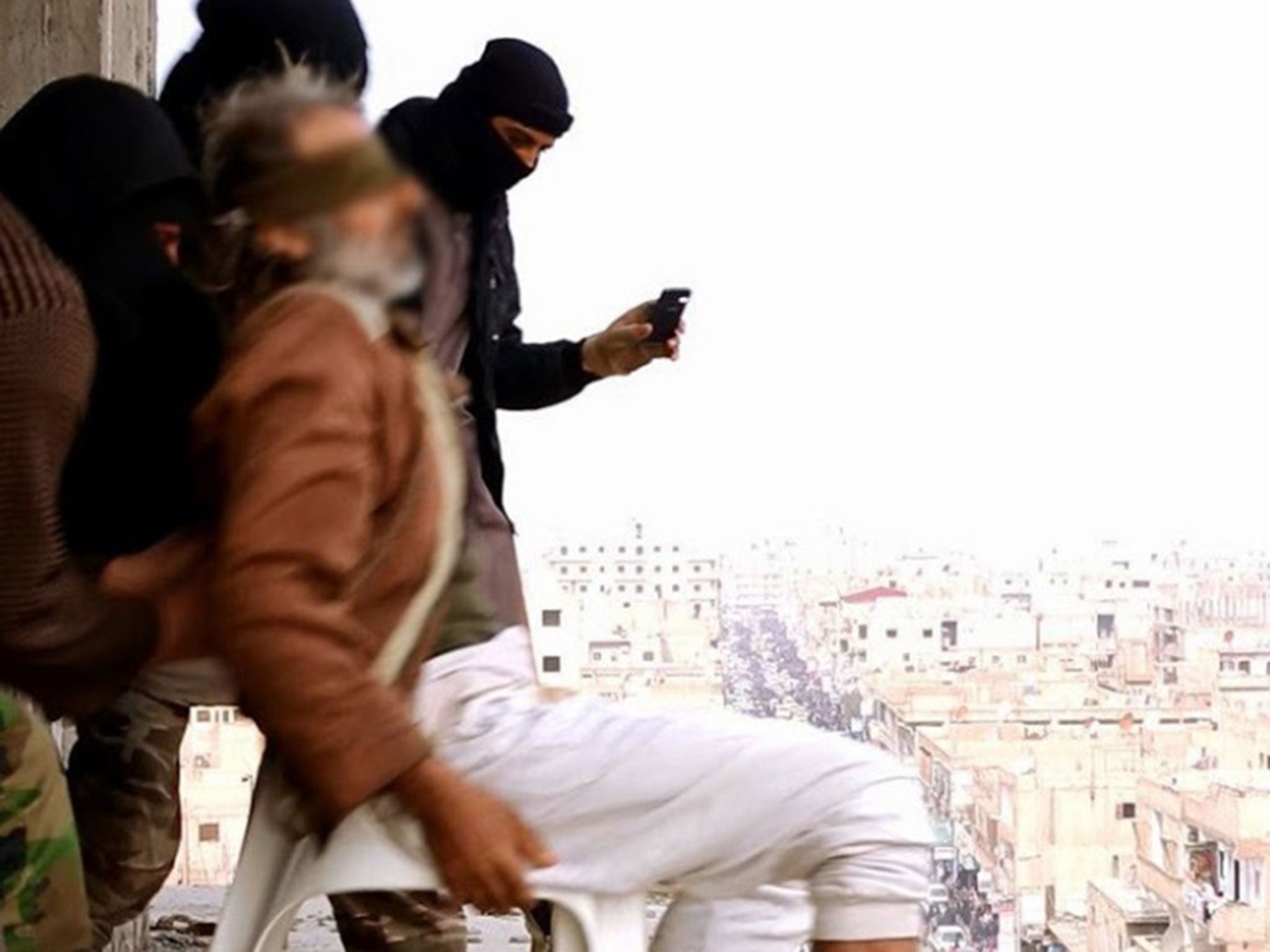 Footage appearing to show a man charged with having a homosexual affair being thrown off a building by Isis militants in Raqqa, Syria