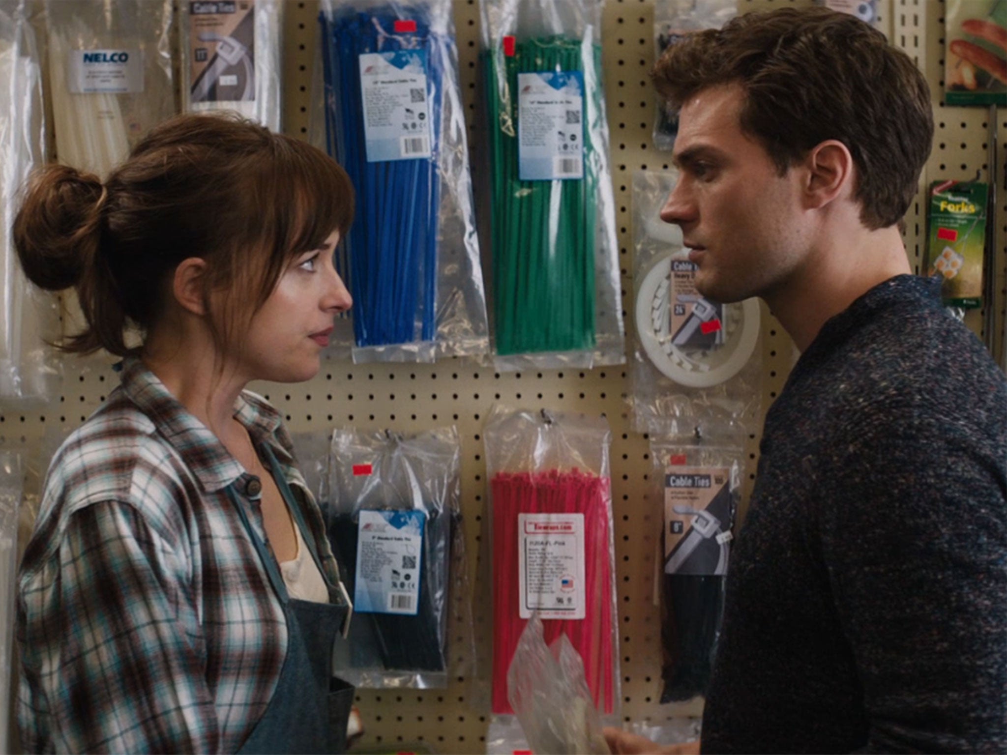 Another wearing scene: Anastasia and Christian meet in a hardware store