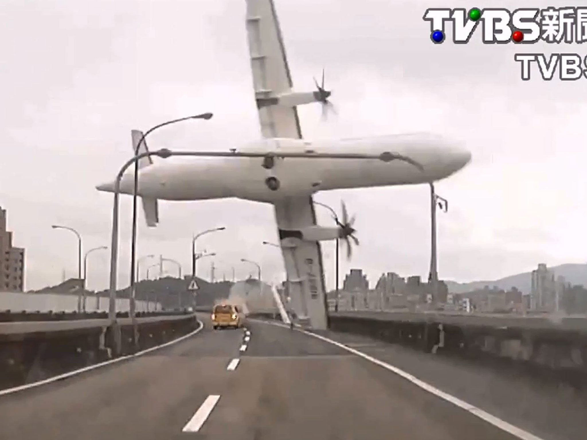 A still from footage showing the plane careering over an overpass (EPA)