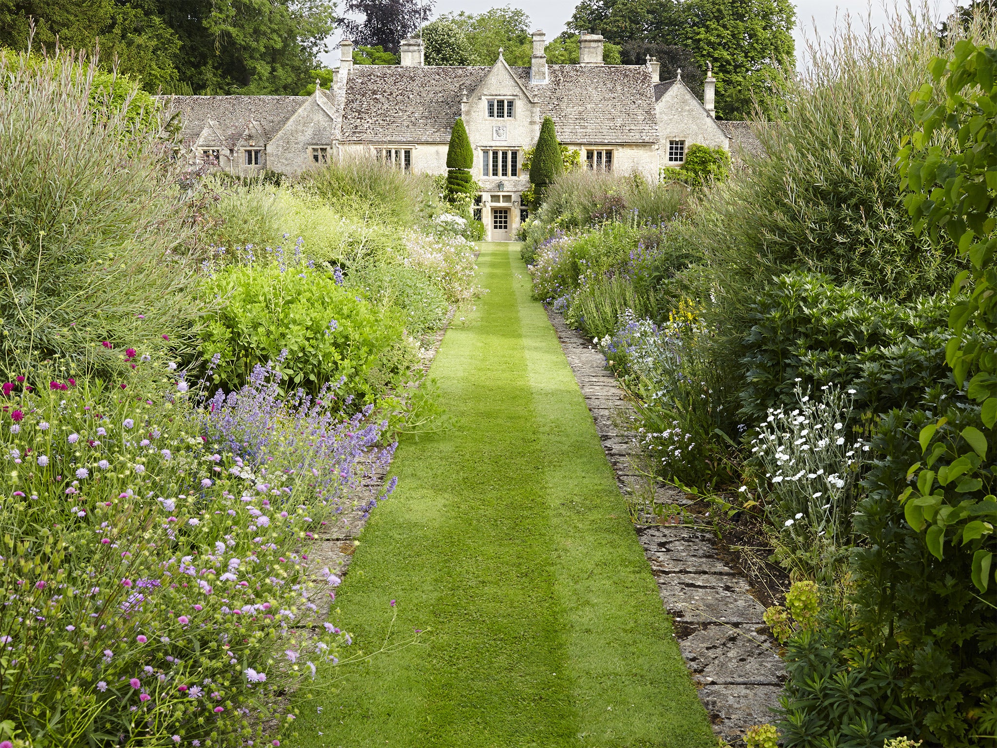 To the manors borne: Westwell Manor, one of the resplendent Cotswold gardens the author writes about in her new book