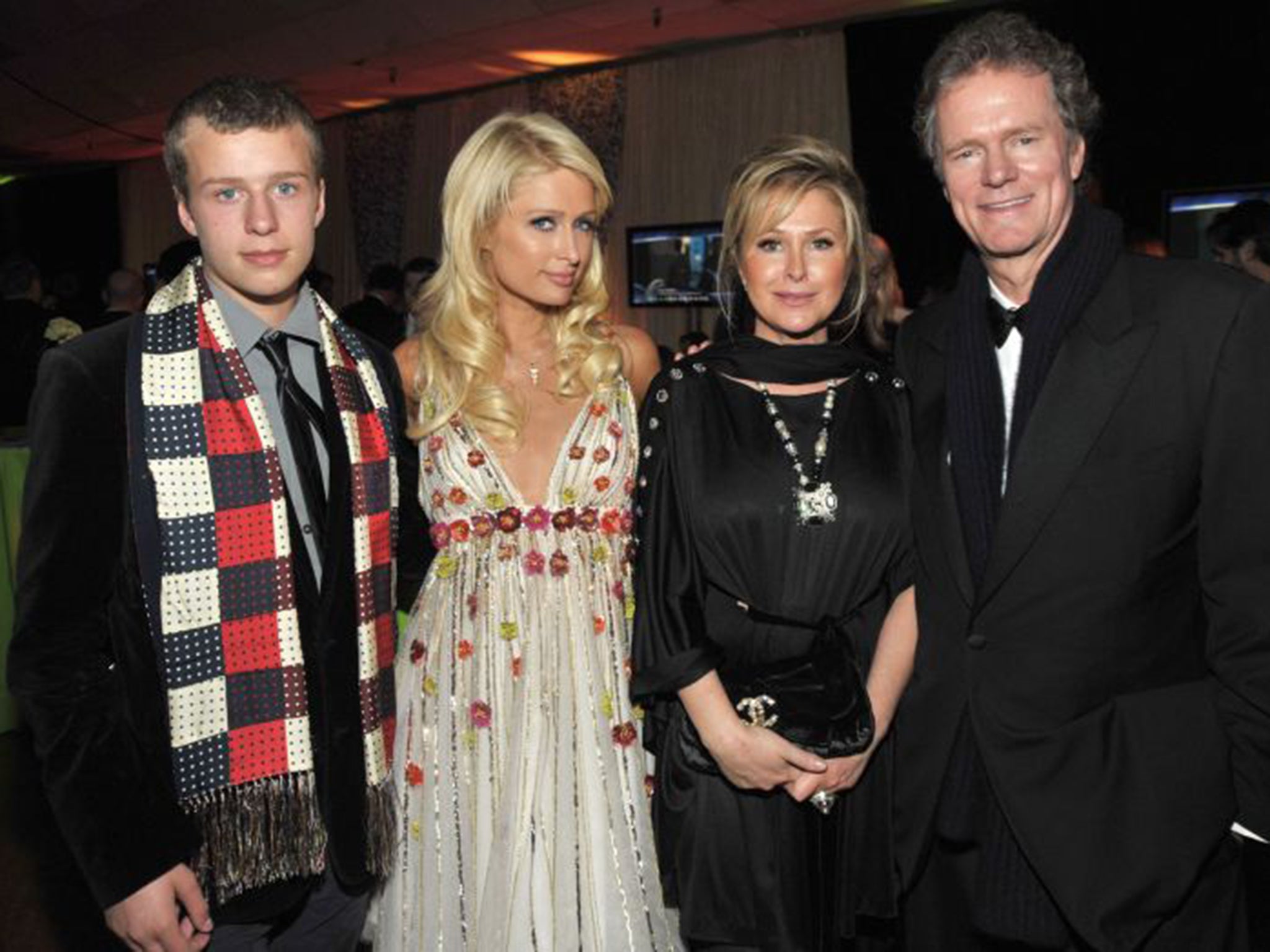 Conrad Hilton with Paris and their parents Kathy and Rick (Getty)