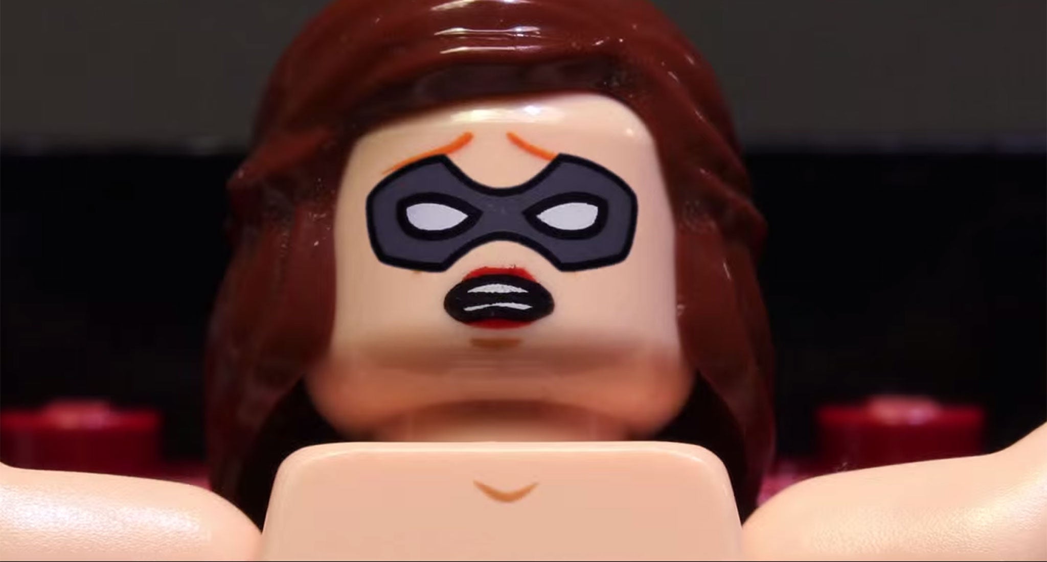 Dakota Johnson as a blindfolded Anastasia Steele in Lego form