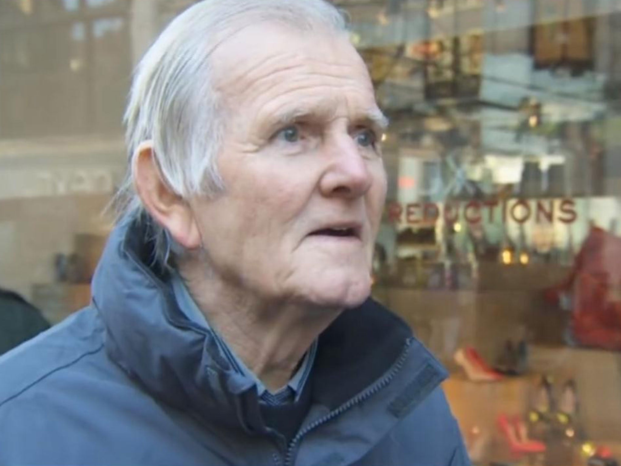 Liverpool’s former goalkeeper Tommy Lawrence as he is stopped by Stuart Flinders (BBC)