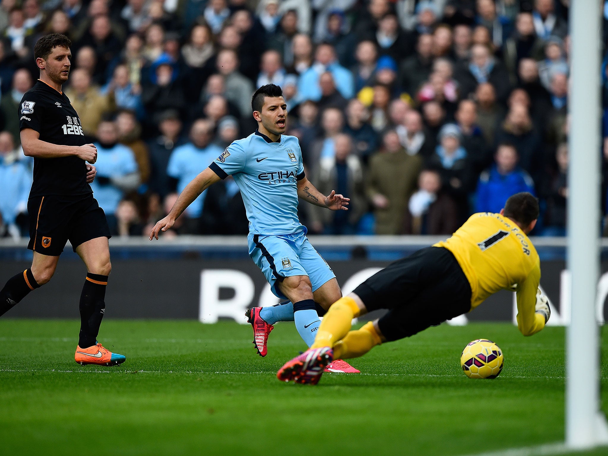 Sergio Aguero has a close-range shot stopped by Allan McGregor