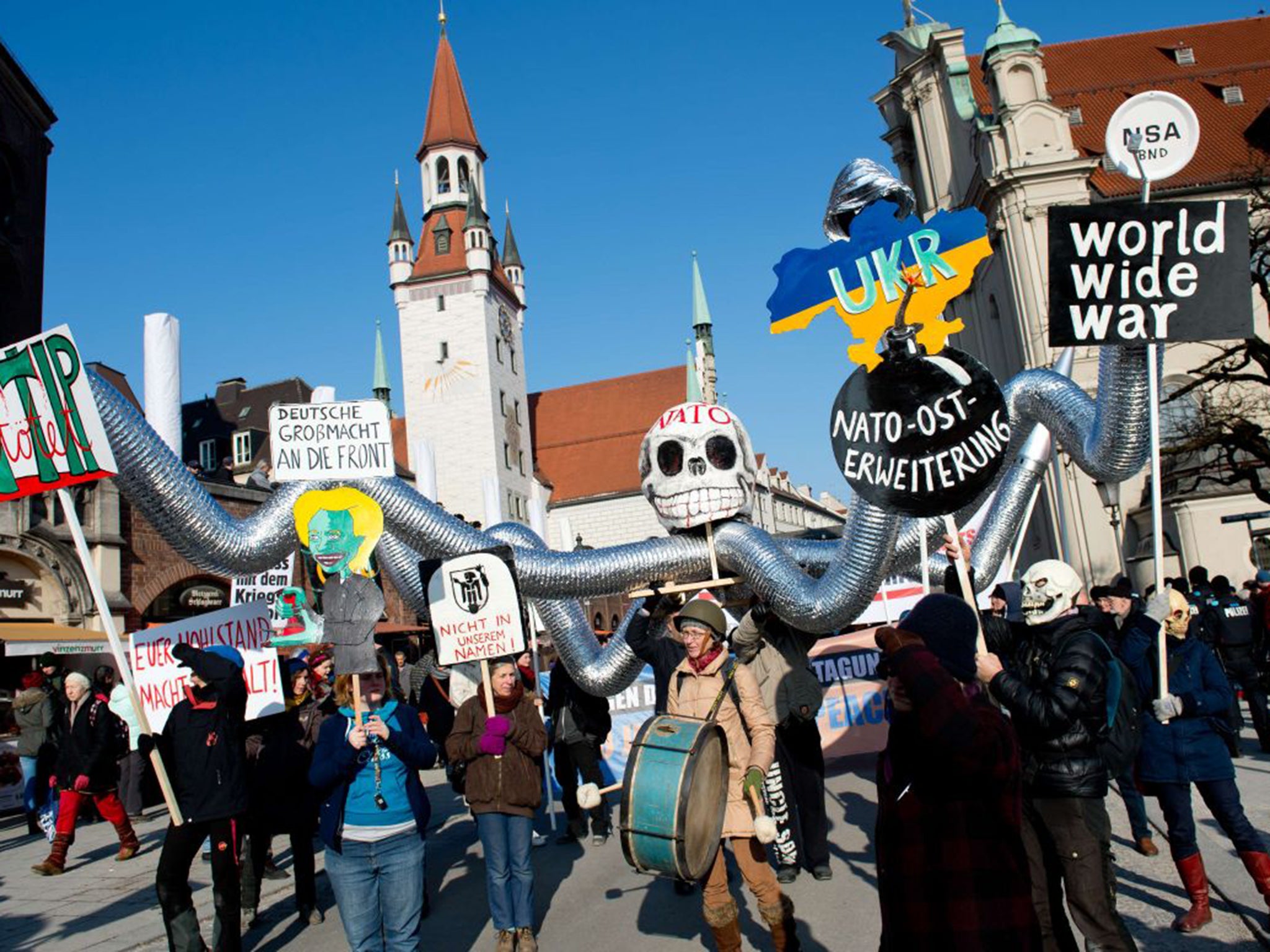 Demonstrators in Munich took part in a protest titled "There is no Peace with NATO" outside the 51st Munich Security Conference