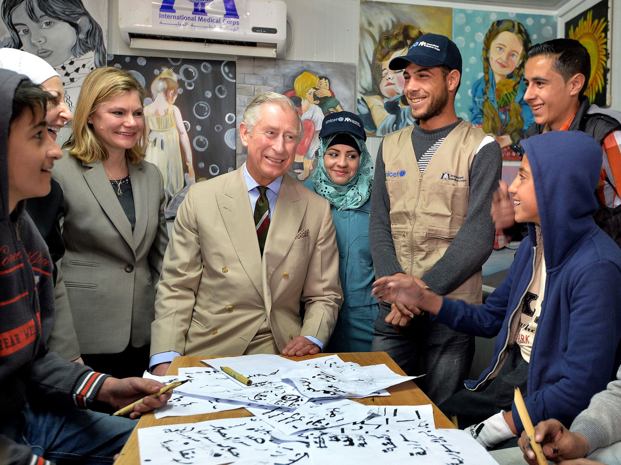 Prince Charles visiting a classroom near the Al Za’atari refugee camp in northern Jordan accompanied by the International Development Secretary, Justine Greening