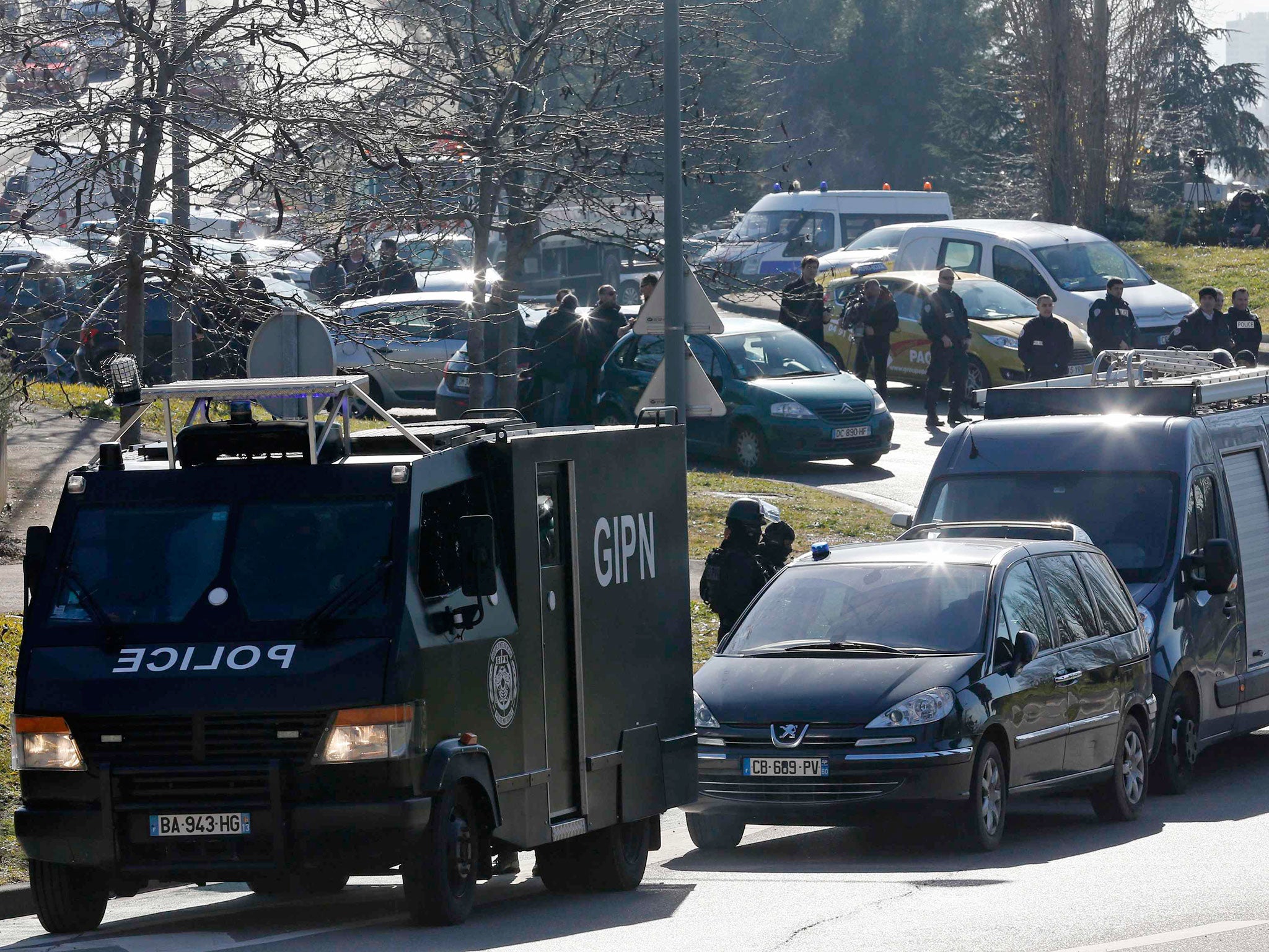 French GIPN police intervention forces vehicles are seen during an operation to secure the Castellane housing area in Marseille